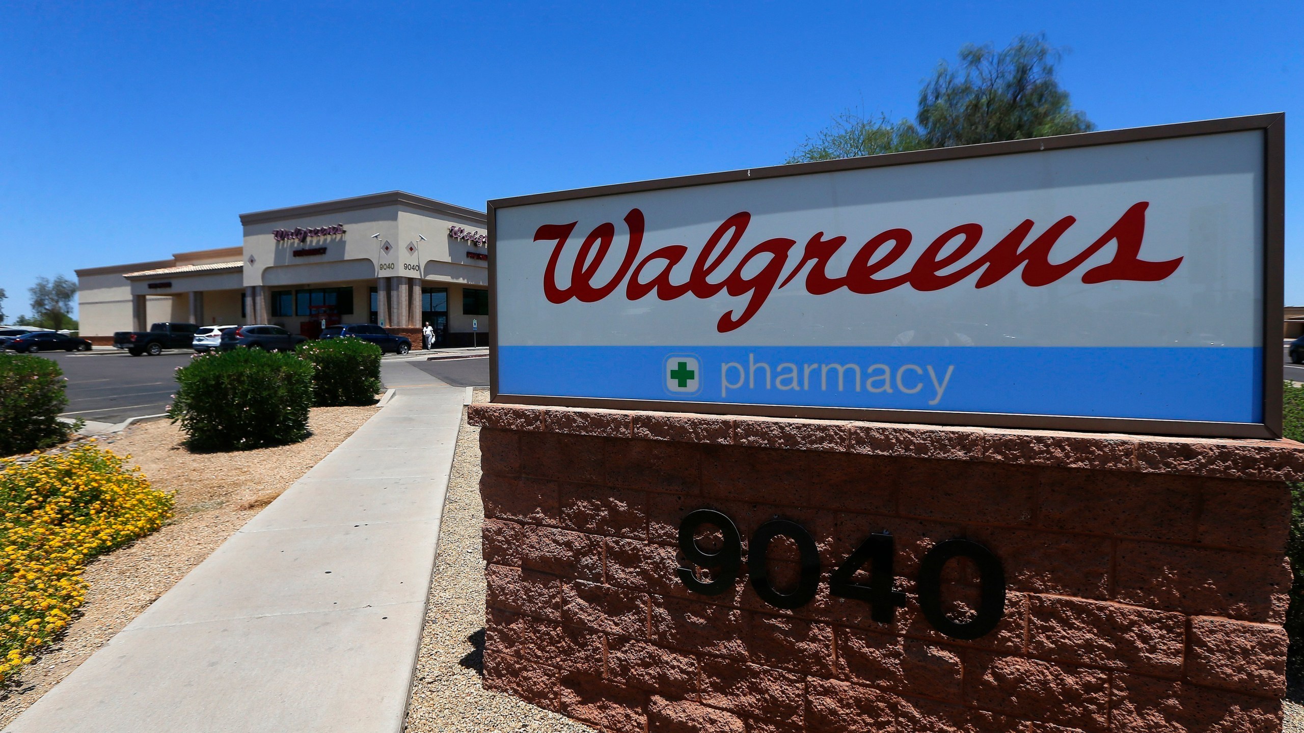 FILE - A Walgreens store is seen, June 25, 2018, in Peoria, Ariz. Some Walgreens pharmacy staff walked off the job this week over concerns that working conditions are putting employees and patients at risk. Organizers on Tuesday, Oct. 10, 2023, estimated that more than 300 Walgreens locations — out of nearly 9,000 nationwide — were affected by walkouts planned for Monday, Oct. 9, through Wednesday, Oct. 11. A company spokesperson said “no more than a dozen” pharmacies experienced disruptions. (AP Photo/Ross D. Franklin, File)