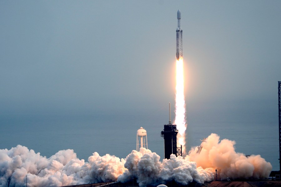 A SpaceX Falcon Heavy rocket lifts off from pad 39A at the Kennedy Space Center in Cape Canaveral, Fla., Friday, Oct. 13, 2023. The spacecraft will travel to the metallic asteroid Psyche, where it will enter orbit in 2029 and be the first spacecraft to explore a metal-rich asteroid. (AP Photo/John Raoux)