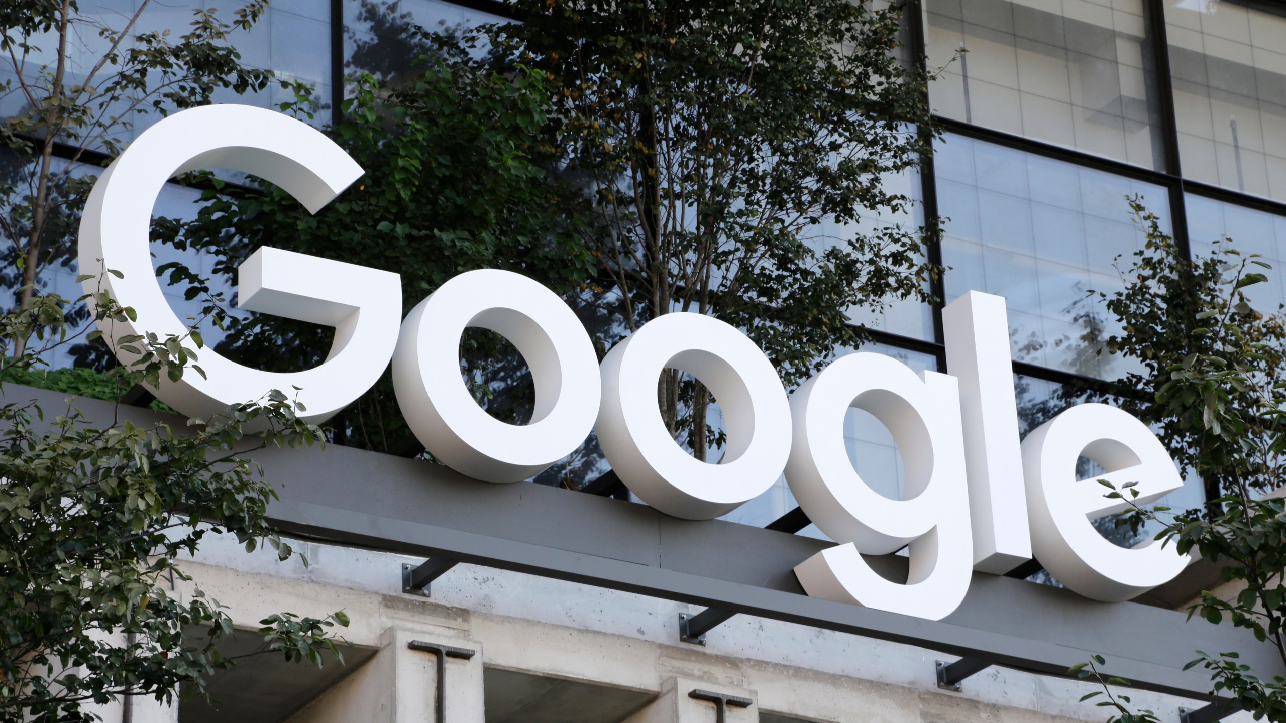 The Google sign is shown over an entrance to the company's new building in New York on Wednesday, Sept. 6, 2023. If government regulators prevail in the biggest U.S. antitrust trial in a quarter century, it's likely to unleash drastic changes designed to undermining the dominance of the Google search engine that defines the internet for billions of people. (AP Photo/Peter Morgan)