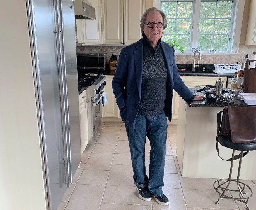 This undated photo provided by Jane Friedman shows Stephen Rubin posing for a picture in his kitchen in West Hampton, N.Y., Rubin, a longtime publishing executive with an eye for bestsellers and a passion for music and public life who helped launched the career of John Grisham, among others, and released such blockbusters as “The Da Vinci Code” and “Fire and Fury,” has died, Friday, Oct. 13, 2023. He was 81. (Jane Friedman via AP)