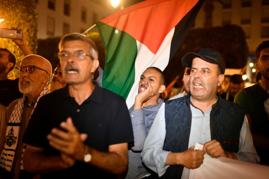 Hundreds of Moroccans take part in a protest in solidarity with Palestinians in Gaza following the bombing of AlAhli hospital, in Rabat, Morocco, Tuesday, Oct. 17, 2023. (AP Photo)