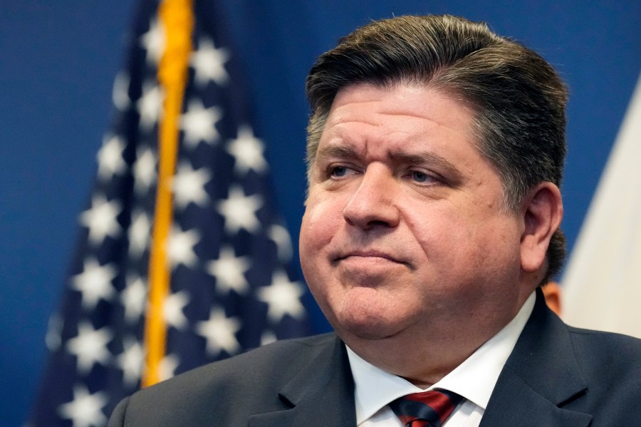 FILE - Illinois Gov. J.B. Pritzker looks out over the crowd during the Illinois Paid Leave bill signing ceremony Monday, March 13, 2023, in Chicago. Pritzker is taking his advocacy for abortion rights nationwide, forming a political organization to fund like-minded efforts outside Illinois, a state that legalized abortion by statute even before the Supreme Court invalidated the right to seek one. (AP Photo/Charles Rex Arbogast)