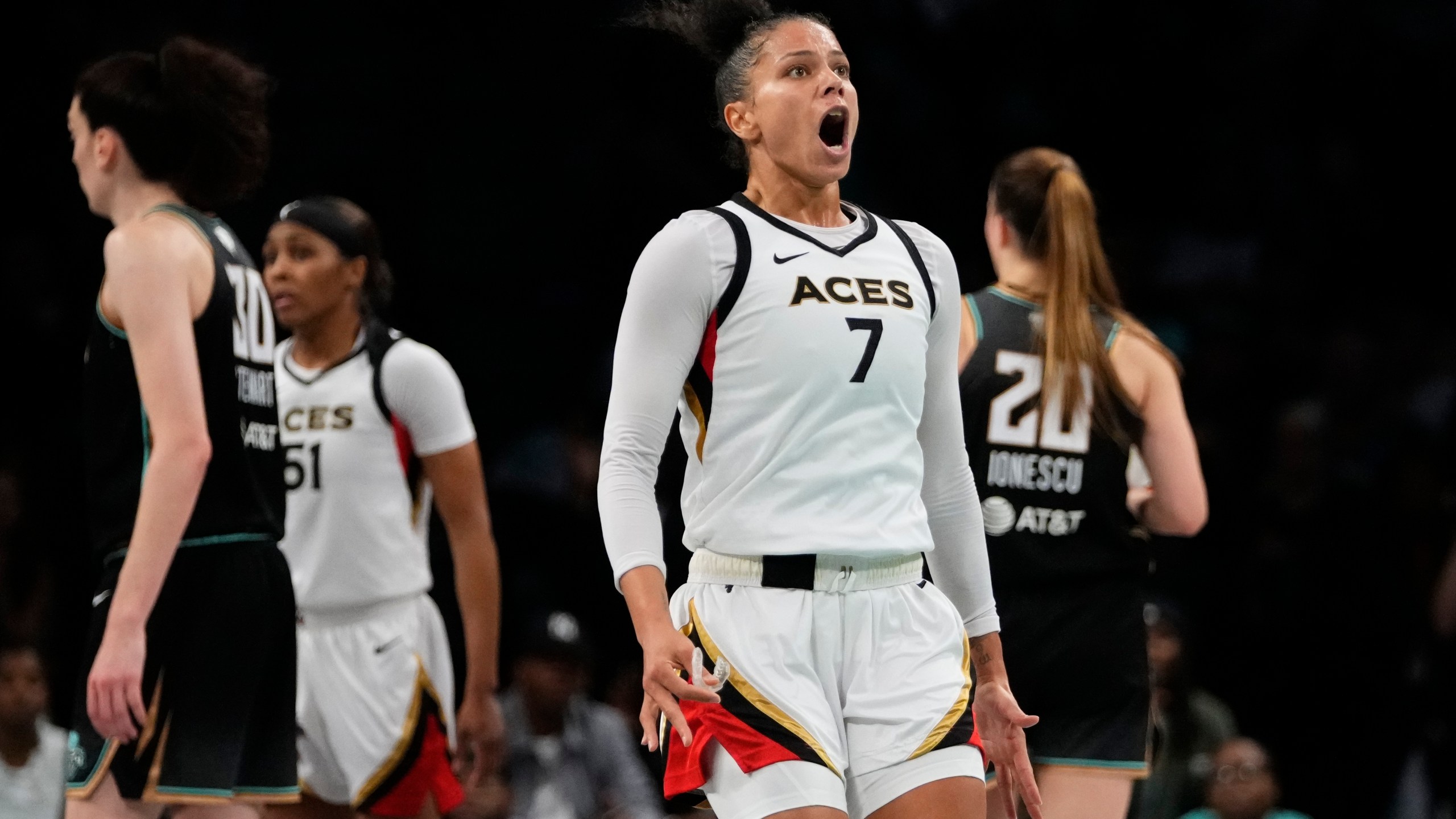 Las Vegas Aces' Alysha Clark (7) reacts to a call during the second half in Game 4 of a WNBA basketball final playoff series against the New York Liberty Wednesday, Oct. 18, 2023, in New York. The Aces won 70-69. (AP Photo/Frank Franklin II)