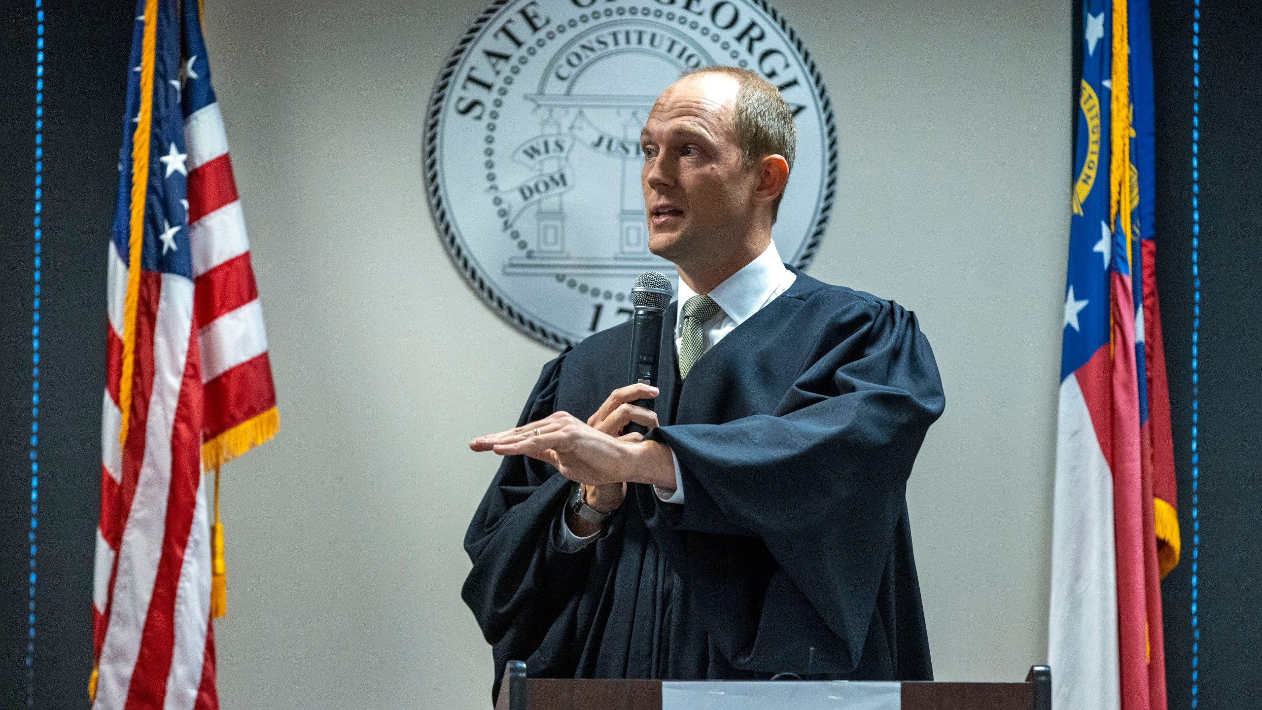 Fulton Superior Court Judge Scott McAfee addresses potential jurors during jury selection for lawyer Kenneth Chesebro's trial, Friday, Oct. 20, 2023, at the Fulton County Courthouse in Atlanta. Jury selection began Friday for Chesebro, the first defendant to go to trial in the Georgia case that accuses former President Donald Trump and others of illegally scheming to overturn the 2020 election in the state. (Alyssa Pointer/Pool Photo via AP)