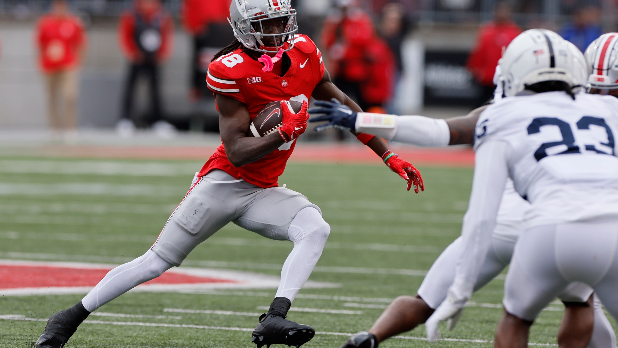 Ohio State receiver Marvin Harrison runs after a catch against Penn State during the first half of an NCAA college football game Saturday, Oct. 21, 2023, in Columbus, Ohio. (AP Photo/Jay LaPrete)