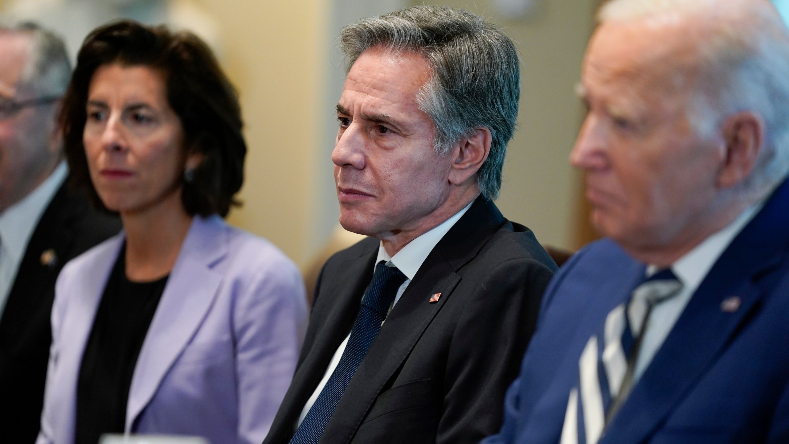 From left, Commerce Secretary Gina Raimondo, Secretary of State Antony Blinken and President Joe Biden listen during a meeting with European Council President Charles Michel and European Commission President Ursula von der Leyen in the Cabinet Room of the White House, Friday, Oct. 20, 2023, in Washington. (AP Photo/Evan Vucci)