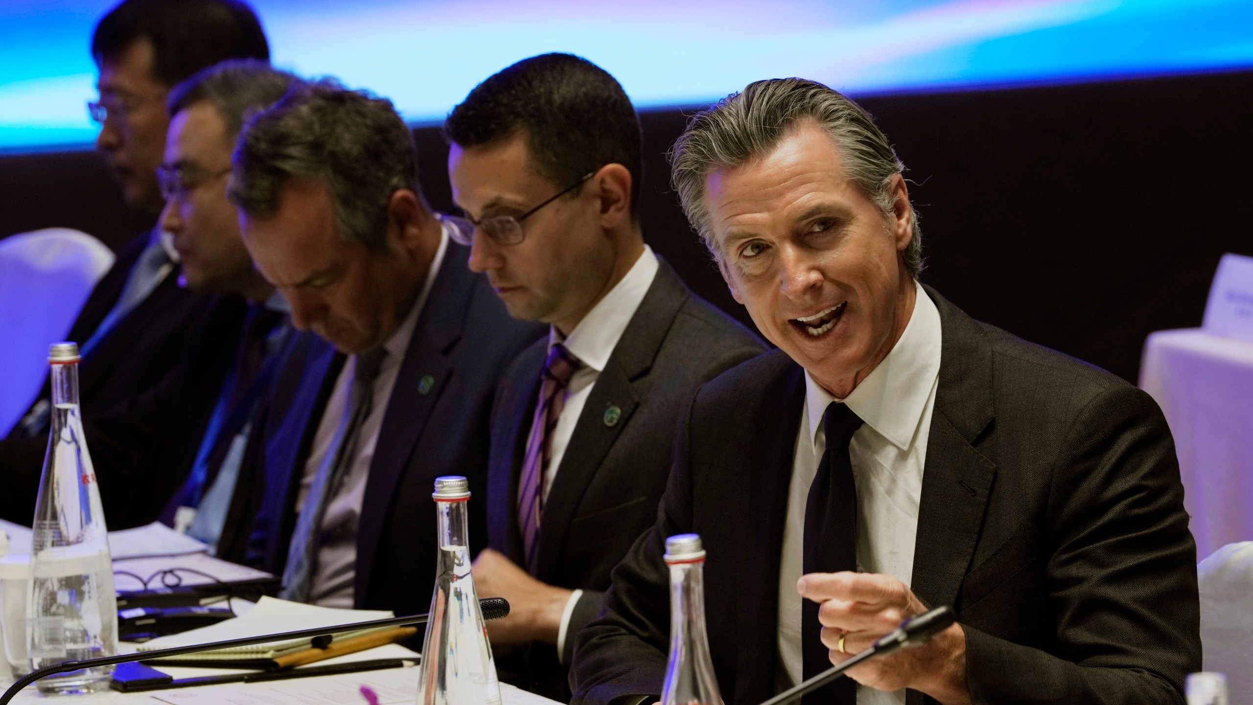 California Gov. Gavin Newsom, right, speaks during the Great Wall Climate Dialogue held at the Yanqi hotel on the outskirts of Beijing, Thursday, Oct. 26, 2023. Newsom is on a weeklong tour of China to push for climate cooperation. (AP Photo/Ng Han Guan)