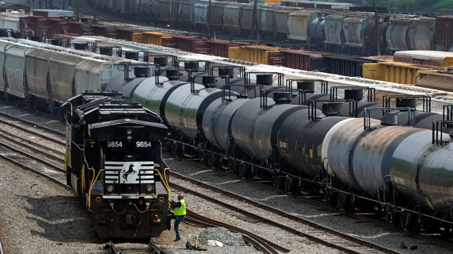 FILE - Norfolk Southern locomotives are moved in Norfolk Southern's Conway Terminal, June 17, 2023, in Conway, Pa. Norfolk Southern has installed the first of what will be more than a dozen automated inspection portals on its tracks in Ohio — not far from where one of its trains derailed in February and spilled hazardous chemicals that caught fire. (AP Photo/Gene J. Puskar, File)