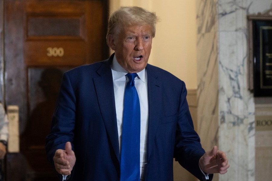 Former President Donald Trump arrives at the courtroom for his civil business fraud trial at New York Supreme Court, Wednesday, Oct. 25, 2023, in New York. (AP Photo/Yuki Iwamura)