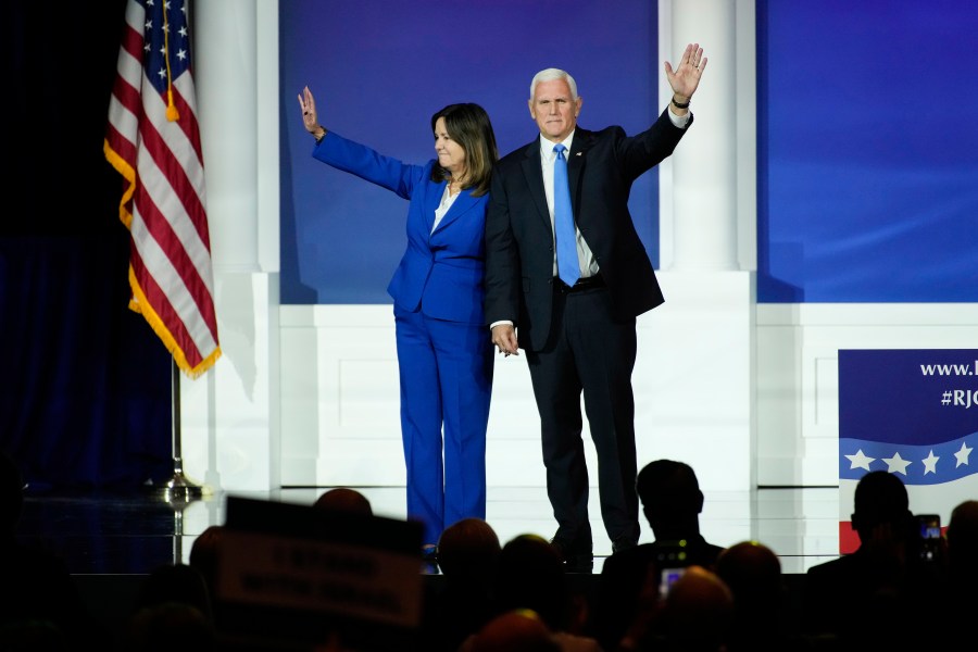 Karen Pence, left, and former Vice President Mike Pence wave to the crowd at an annual leadership meeting of the Republican Jewish Coalition, Saturday, Oct. 28, 2023, in Las Vegas. (AP Photo/John Locher)