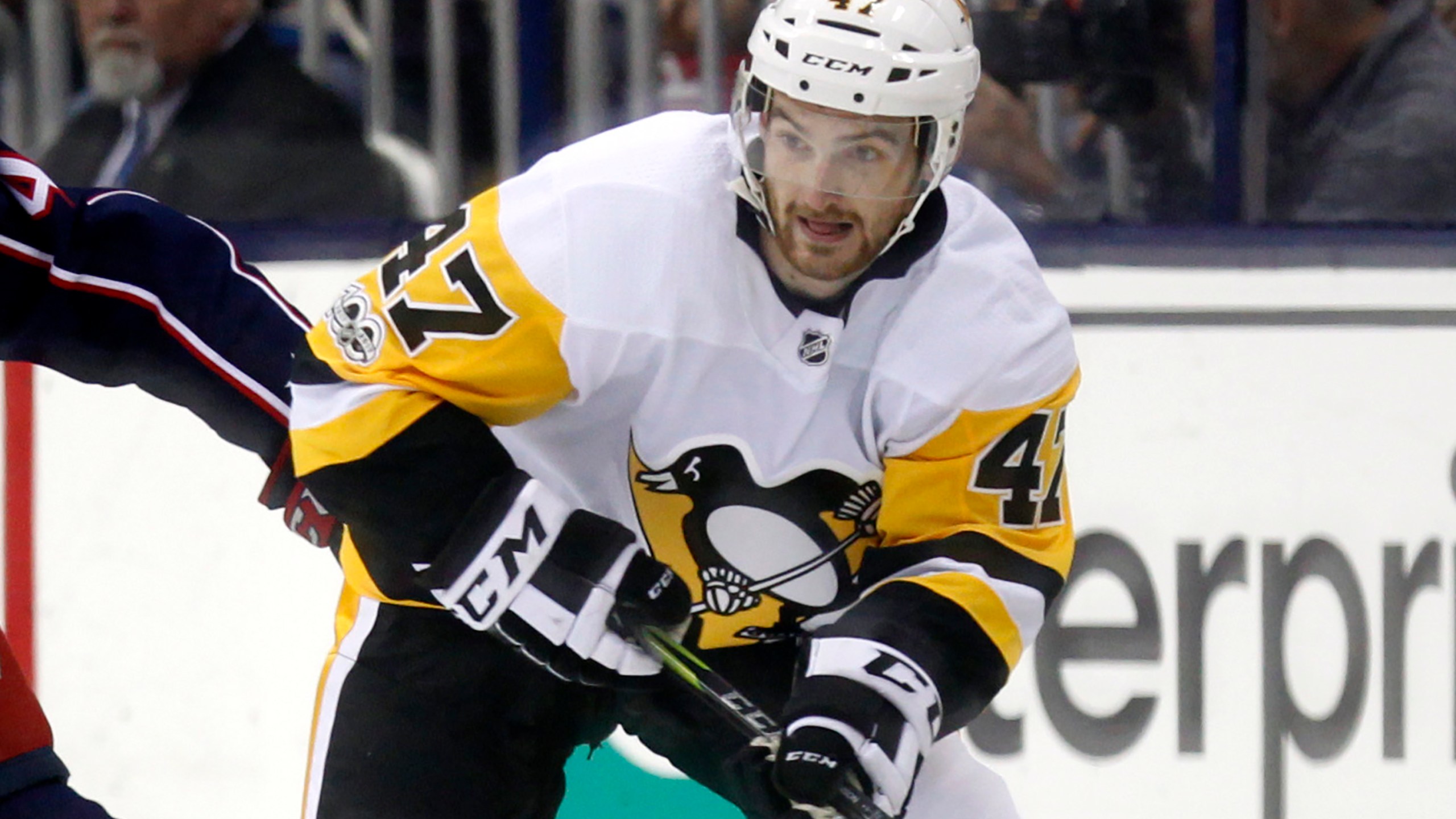 FILE - Pittsburgh Penguins forward Adam Johnson in action during an NHL hockey game in Columbus, Ohio, Friday, Sept. 22, 2017. American hockey player Adam Johnson has died after a “freak accident” during a game in England on Saturday, Oct. 28, 2023 his club said. The 29-year-old Minnesota native was playing for the Nottingham Panthers in a Challenge Cup game against the Sheffield Steelers when he suffered a slashed neck during the second period of the game at Sheffield’s Utilita Arena. (AP Photo/Paul Vernon, file)