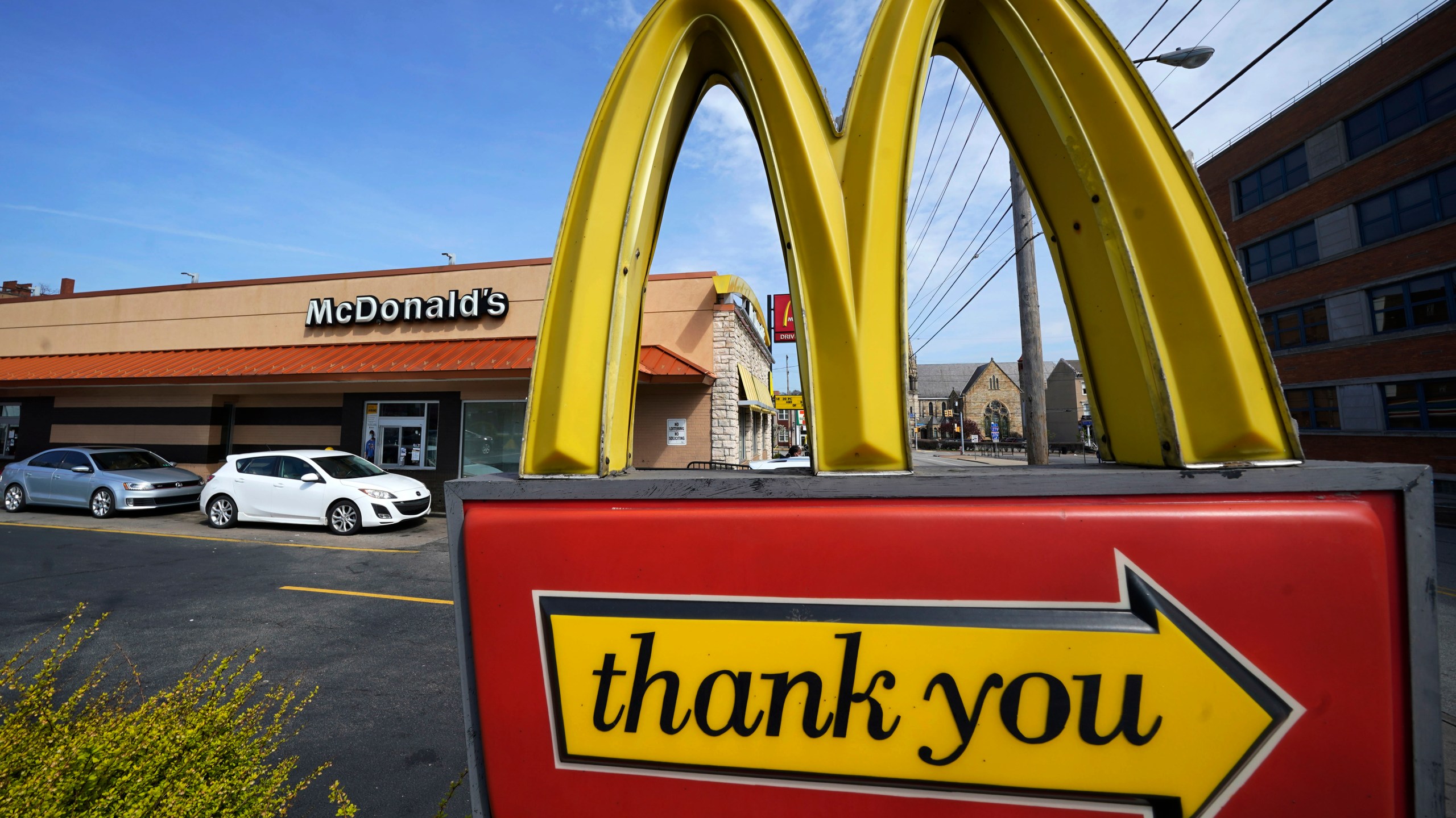 FILE - An exit sign is shown at a McDonald's restaurant in Pittsburgh, April 23, 2022. McDonald's reports earnings on Monday Oct. 30, 2023. (AP Photo/Gene J. Puskar, File)