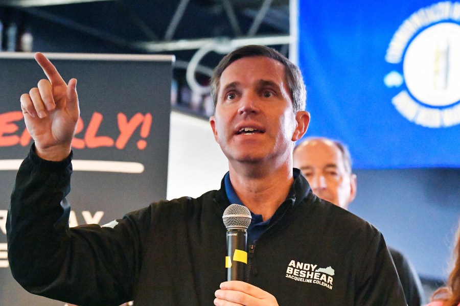 Kentucky Governor and Democratic candidate for re-election Andy Beshear speaks to supporters during a stop of his statewide bus tour in Richmond, Ky., Monday, Oct. 30, 2023. (AP Photo/Timothy D. Easley)