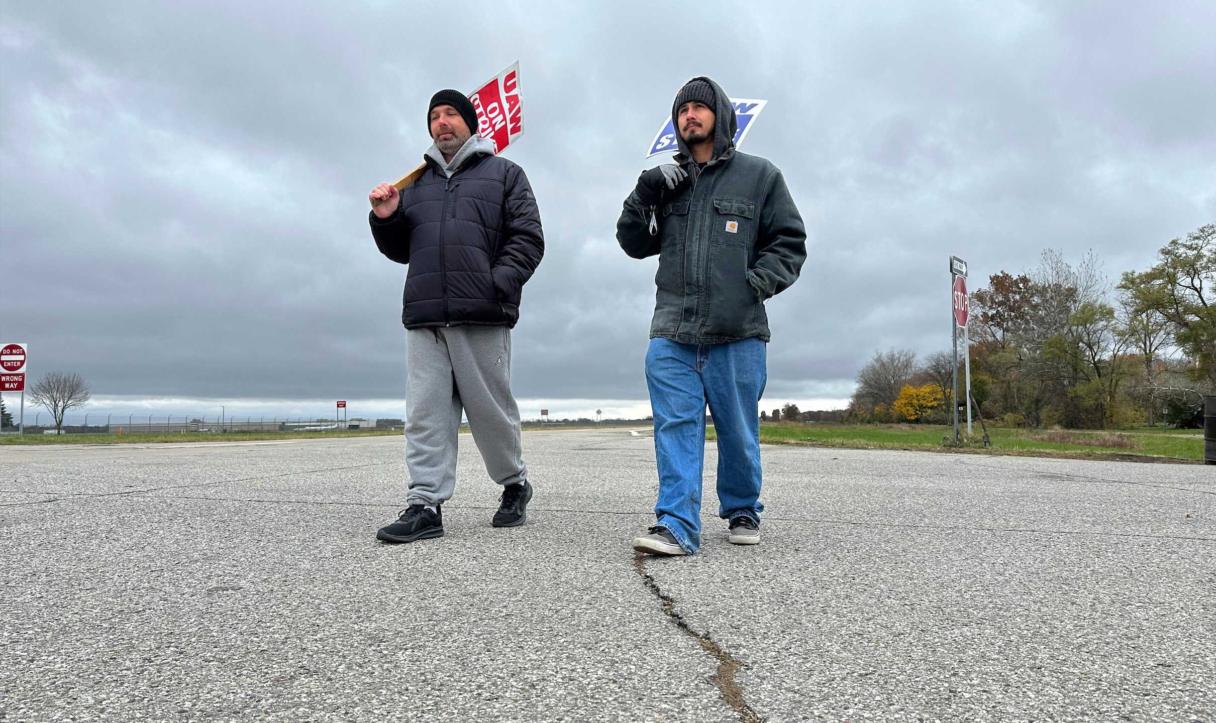 United Auto Workers members walk on the picket line outside a General Motors facility in Van Buren Township, Mich., Monday, Oct. 30, 2023. General Motors and the United Auto Workers union have reached a tentative contract agreement that could end a six-week-old strike against Detroit automakers, two people briefed on the deal said Monday. (AP Photo/Mike Householder)