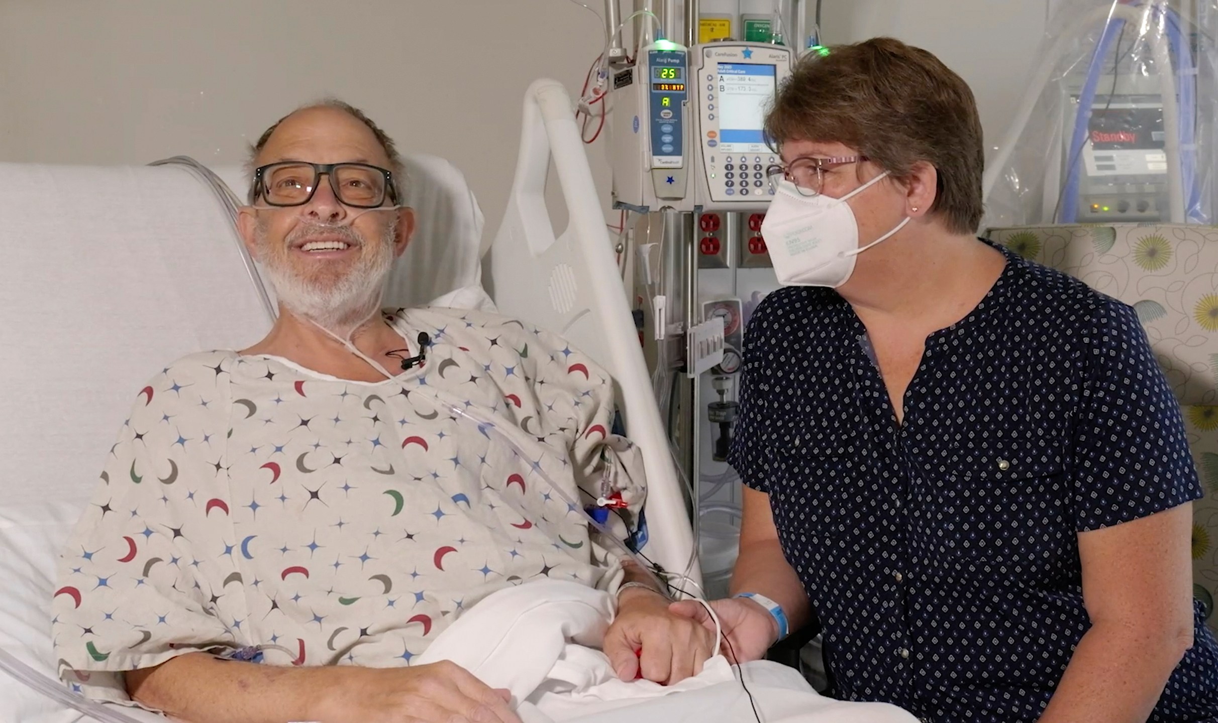 FILE - In this photo provided by the University of Maryland School of Medicine, Lawrence Faucette sits with wife, Ann, in the school's hospital in Baltimore, Md., in September 2023, before receiving a pig heart transplant. Lawrence Faucette, the second person to receive a transplanted heart from a pig has died, nearly six weeks after the highly experimental surgery, his doctors announced Tuesday, Oct. 31, 2023. (Mark Teske/University of Maryland School of Medicine via AP, File)