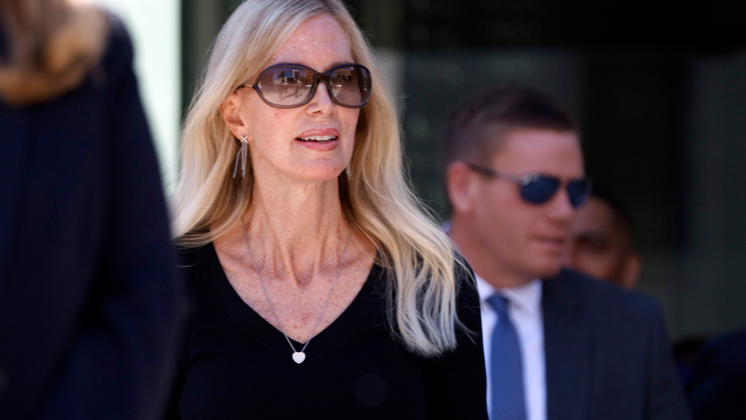 Beth Holloway walks out to speak to media after the appearance of Joran van der Sloot outside the Hugo L. Black Federal Courthouse Wednesday, Oct. 18, 2023, in Birmingham, Ala. Van der Sloot, the chief suspect in Natalee Holloway’s 2005 disappearance in Aruba admitted he killed her and disposed of her remains, and has agreed to plead guilty to charges he tried to extort money from the teen's mother years later, a U.S. judge said Wednesday. (AP Photo/ Butch Dill )