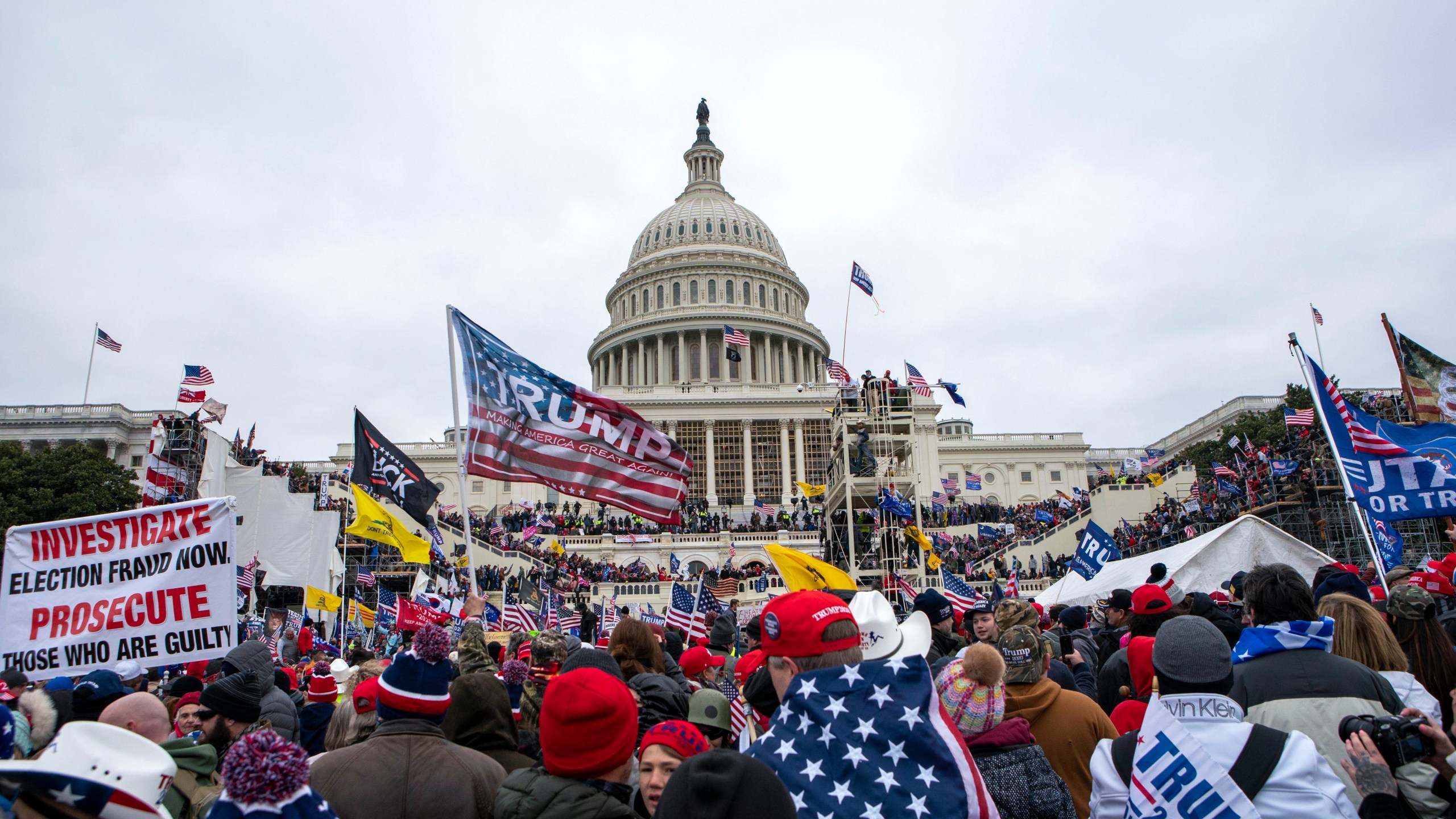 FILE - Insurrections loyal to President Donald Trump rally at the U.S. Capitol in Washington on Jan. 6, 2021. Lawsuits playing out in two states this week seeking to keep former President Donald Trump off the ballot rely on a constitutional clause barring those from office who “have engaged in insurrection.” One challenge has become clear during the hearings in Colorado and Minnesota: No one can agree on how to define an insurrection. (AP Photo/Jose Luis Magana, File)