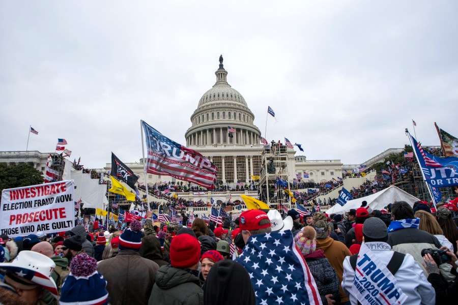 FILE - Insurrections loyal to President Donald Trump rally at the U.S. Capitol in Washington on Jan. 6, 2021. Lawsuits playing out in two states this week seeking to keep former President Donald Trump off the ballot rely on a constitutional clause barring those from office who “have engaged in insurrection.” One challenge has become clear during the hearings in Colorado and Minnesota: No one can agree on how to define an insurrection. (AP Photo/Jose Luis Magana, File)