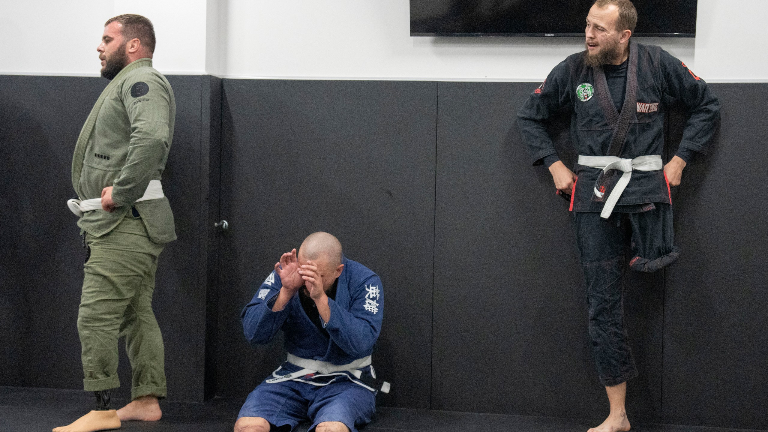 War veterans attend a jiu jitsu training session in Kyiv, Ukraine, Tuesday, Oct. 3, 2023. More than 20,000 people in the Ukraine have lost limbs from injuries since the start of the Russian war, many of them soldiers. Some of them have learned to deal with their psychological trauma by practicing a form of Brazilian jiu-jitsu. (AP Photo/Efrem Lukatsky)