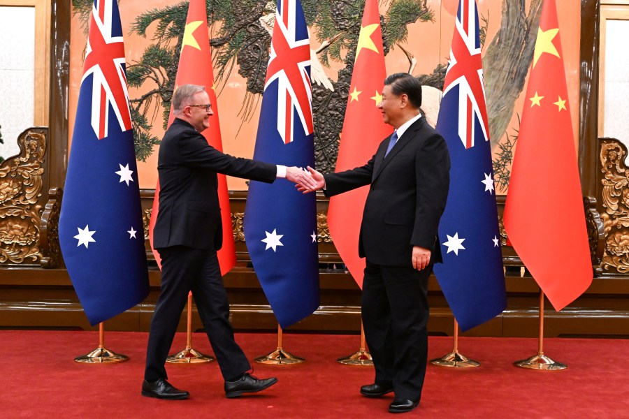 Australia's Prime Minister Anthony Albanese, left, meets with China's President Xi Jinping at the Great Hall of the People in Beijing, China, Monday, Nov. 6, 2023. Albanese is on a three-day visit to China. (Lukas Coch/AAP Image via AP)