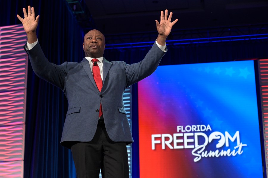 Republican presidential candidate Sen. Tim Scott, R-S.C., acknowledges attendees after speaking at the Republican Party of Florida Freedom Summit, Saturday, Nov. 4, 2023, in Kissimmee, Fla. (AP Photo/Phelan M. Ebenhack)