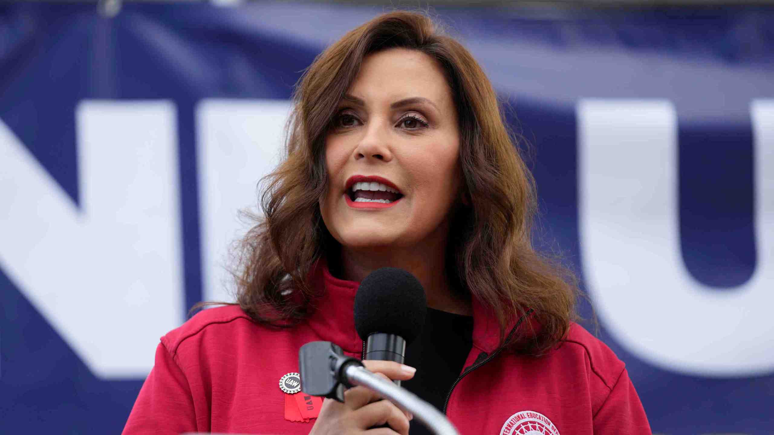 Michigan Governor Gretchen Whitmer speaking at a rally.