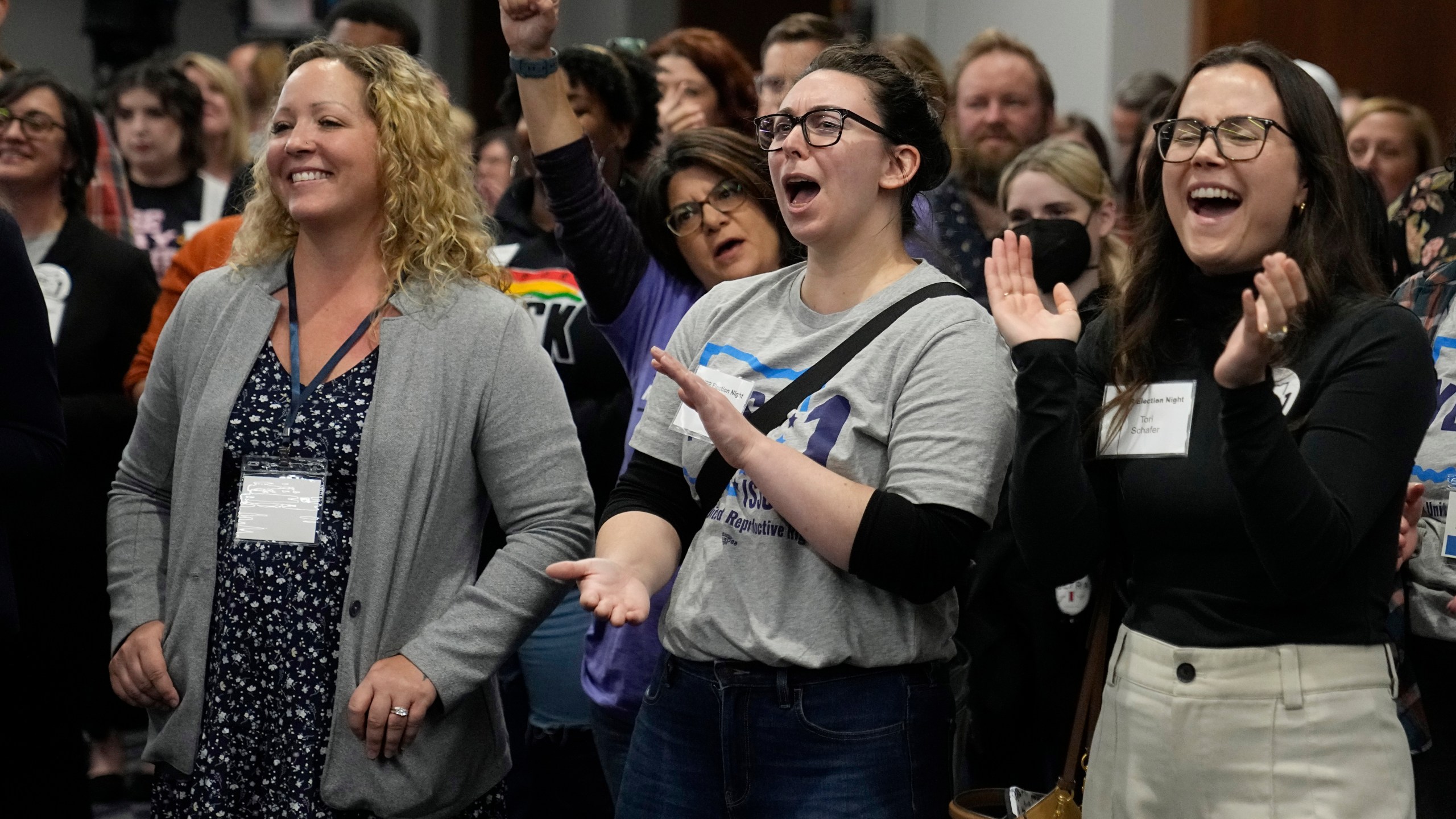 Supporters of Issue 1 cheer at a watch party, Tuesday, Nov. 7, 2023, in Columbus Ohio. (AP Photo/Sue Ogrocki)