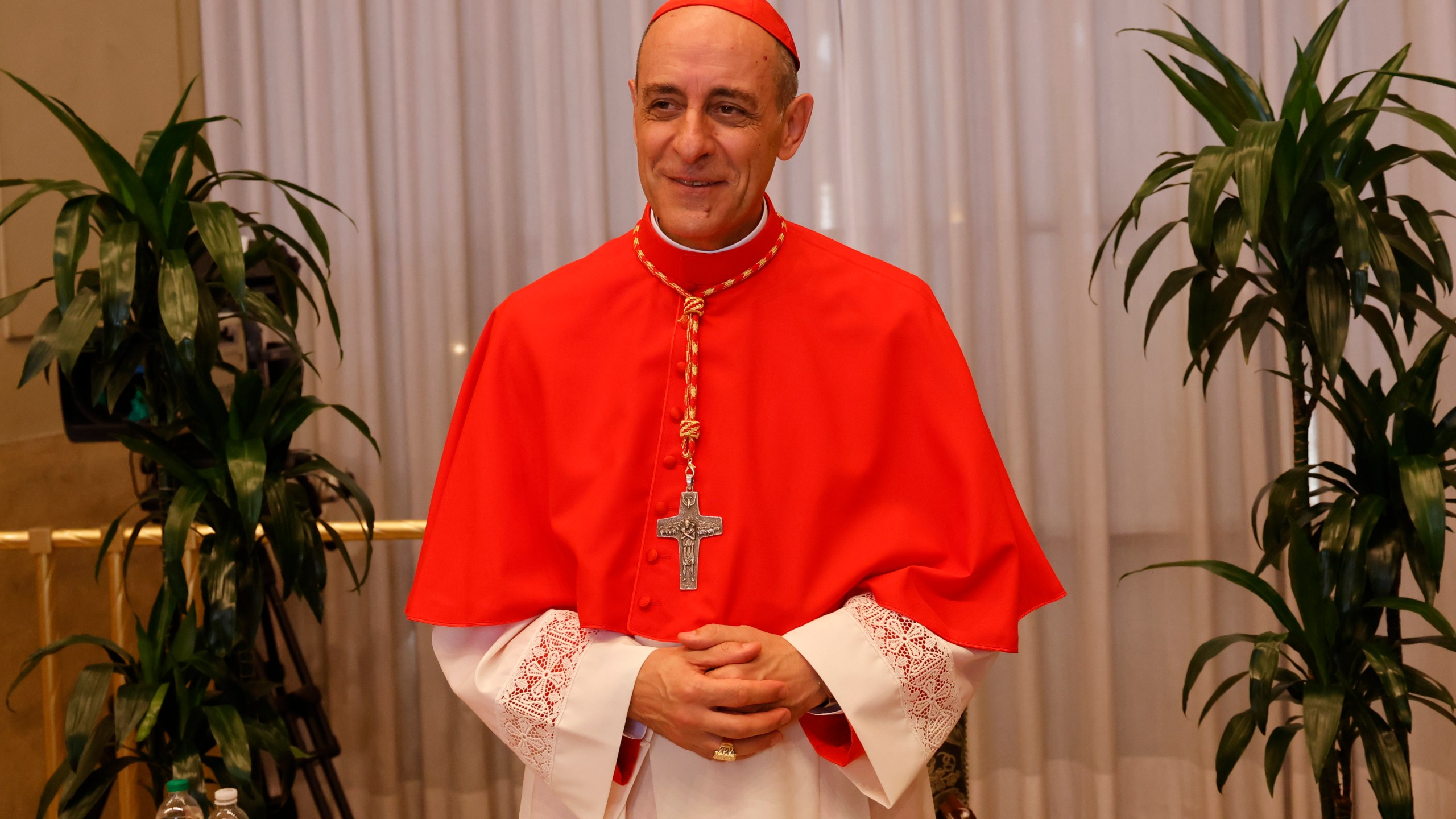 FILE - Cardinal Víctor Manuel Fernández, Prefect of the Dicastery for the Doctrine of the Faith, poses for a photo, Sept. 30, 2023, in St. Peter's Square at the Vatican. In the United States, the national conference of Catholic bishops rejects the concept of gender transition. On Wednesday, Nov. 8, the Vatican made public a sharply contrasting statement, saying it’s permissible, under certain circumstances, for trans Catholics to be baptized and serve as godparents. The document was signed Oct. 21 by Pope Francis and Fernández. (AP Photo/Riccardo De Luca, File)