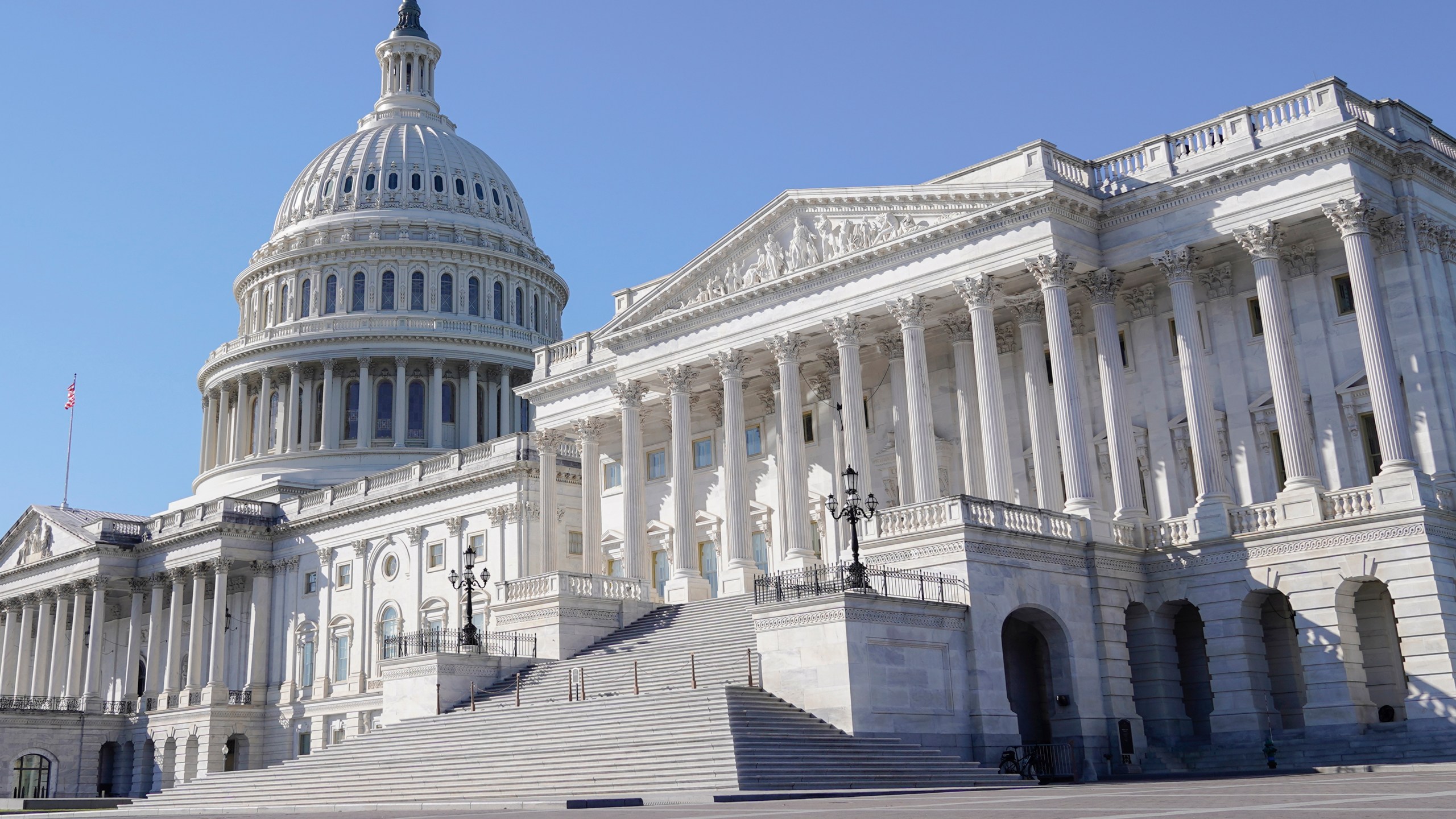 FILE -The U.S Capitol is seen on Friday, Nov. 3, 2023, in Washington. The credit rating agency Moody’s Investors Service lowered its outlook on the U.S. government's debt on Friday, Nov. 10, 2023 to “negative” from “stable,” citing the cost of rising interest rates and political polarization in Congress. (AP Photo/Mariam Zuhaib, File)