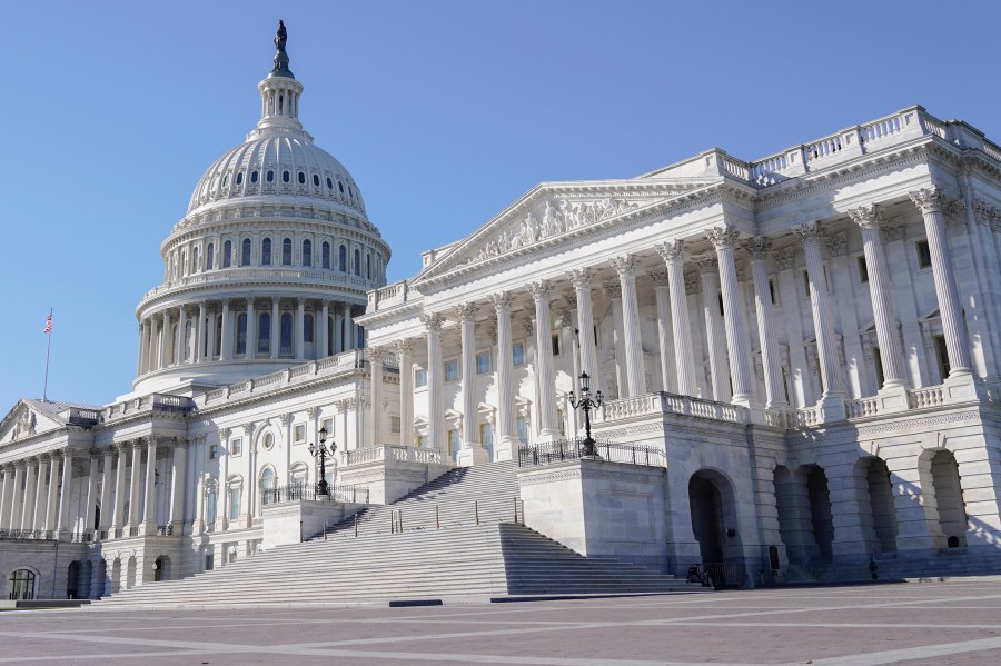 FILE -The U.S Capitol is seen on Friday, Nov. 3, 2023, in Washington. The credit rating agency Moody’s Investors Service lowered its outlook on the U.S. government's debt on Friday, Nov. 10, 2023 to “negative” from “stable,” citing the cost of rising interest rates and political polarization in Congress. (AP Photo/Mariam Zuhaib, File)