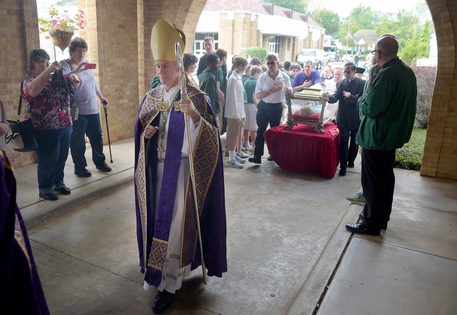 FILE - Bishop Joseph Strickland walks in front of a reliquary bearing the bones of Saint Maria Goretti, dubbed "The Little Saint of Great Mercy," into the sanctuary at Cathedral of the Immaculate Conception on Monday, Nov. 2, 2015, in Tyler, Texas. Pope Francis on Saturday, Nov. 11, 2023 forcibly removed from office the bishop of Tyler, Texas, a conservative active on social media who has been a fierce critic of the pontiff and some of his priorities. (Andrew D. Brosig/Tyler Morning Telegraph via AP, File)