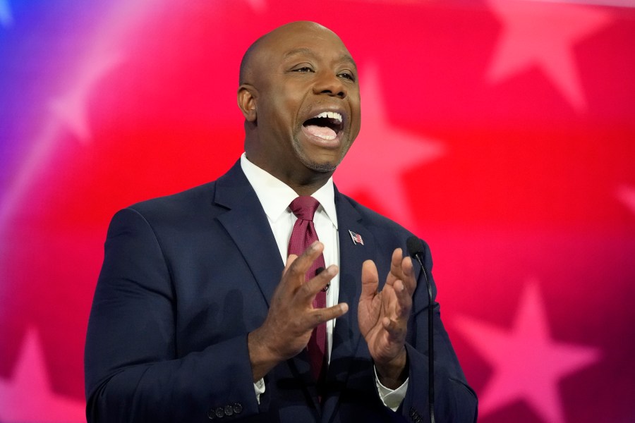 Republican presidential candidate Sen. Tim Scott, R-S.C., speaks during a Republican presidential primary debate hosted by NBC News, Wednesday, Nov. 8, 2023, at the Adrienne Arsht Center for the Performing Arts of Miami-Dade County in Miami. (AP Photo/Rebecca Blackwell)