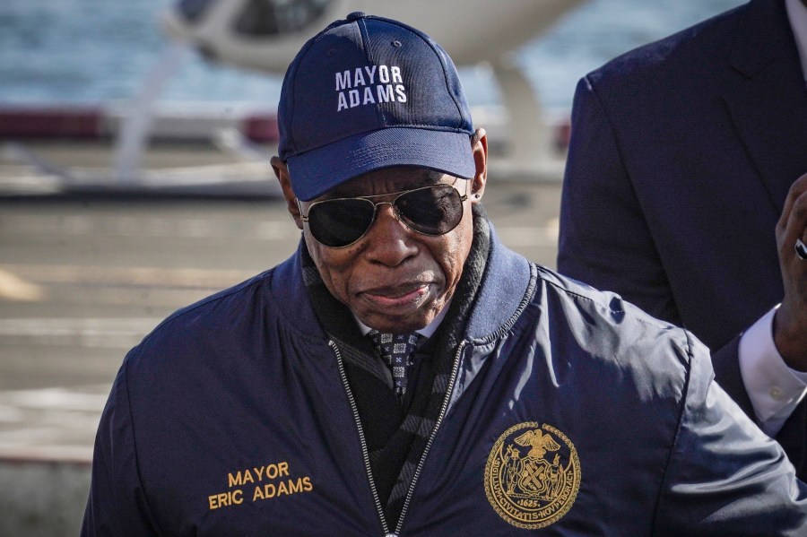 New York City Mayor Eric Adams leaves a news conference at Manhattan's downtown heliport, after announcing the city's support for electric vertical takeoff and landing aircraft, Monday, Nov. 13, 2023, in New York. (AP Photo/Bebeto Matthews)