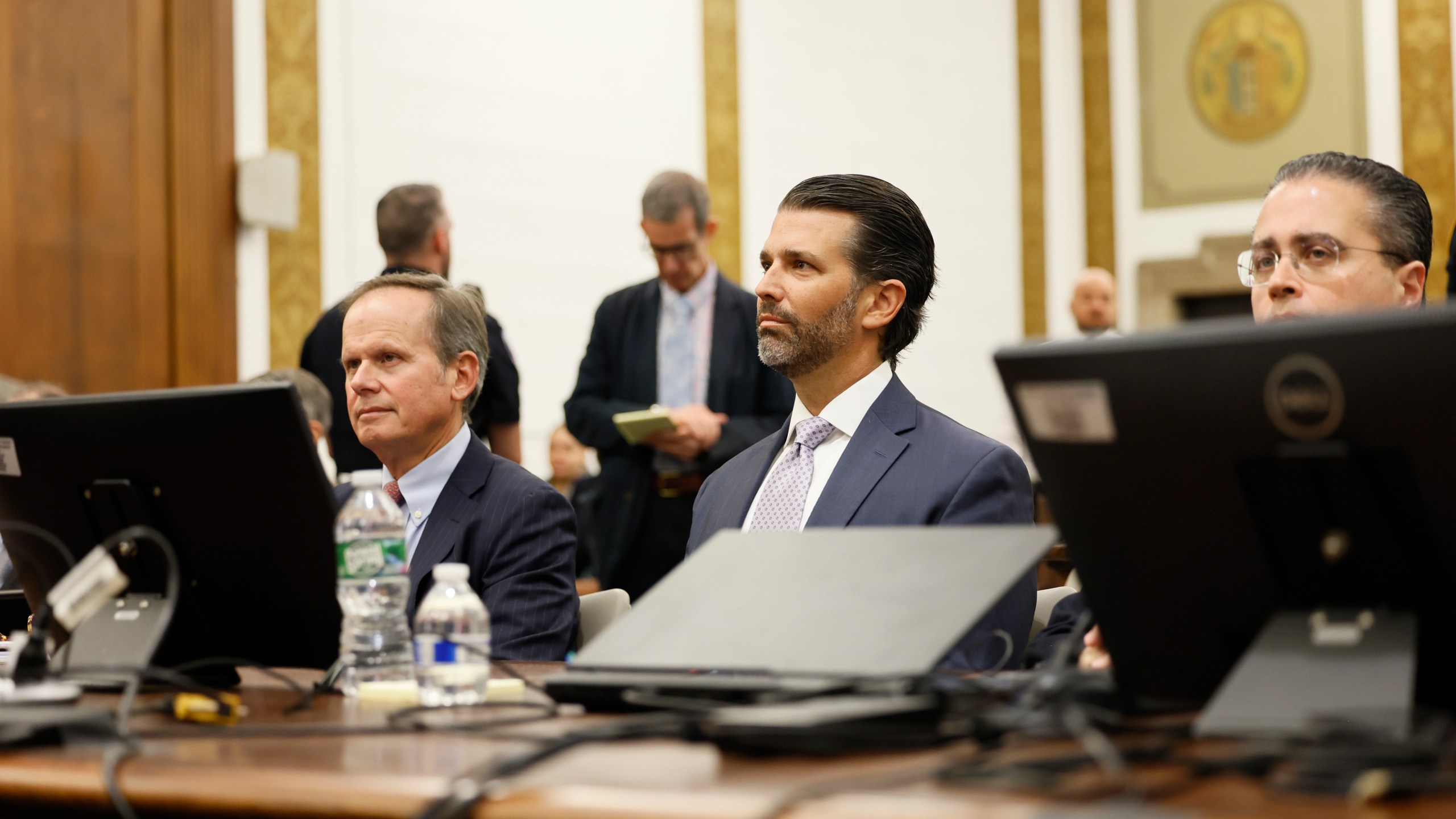 Donald Trump, Jr. sits in the courtroom with his legal team before the continuation of his civil business fraud trial at New York Supreme Court, Monday, Nov. 13, 2023, in New York. (Michael M. Santiago//Pool Photo via AP)