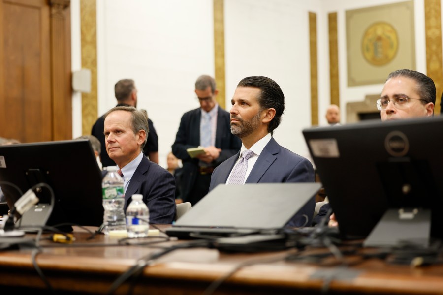 Donald Trump, Jr. sits in the courtroom with his legal team before the continuation of his civil business fraud trial at New York Supreme Court, Monday, Nov. 13, 2023, in New York. (Michael M. Santiago//Pool Photo via AP)