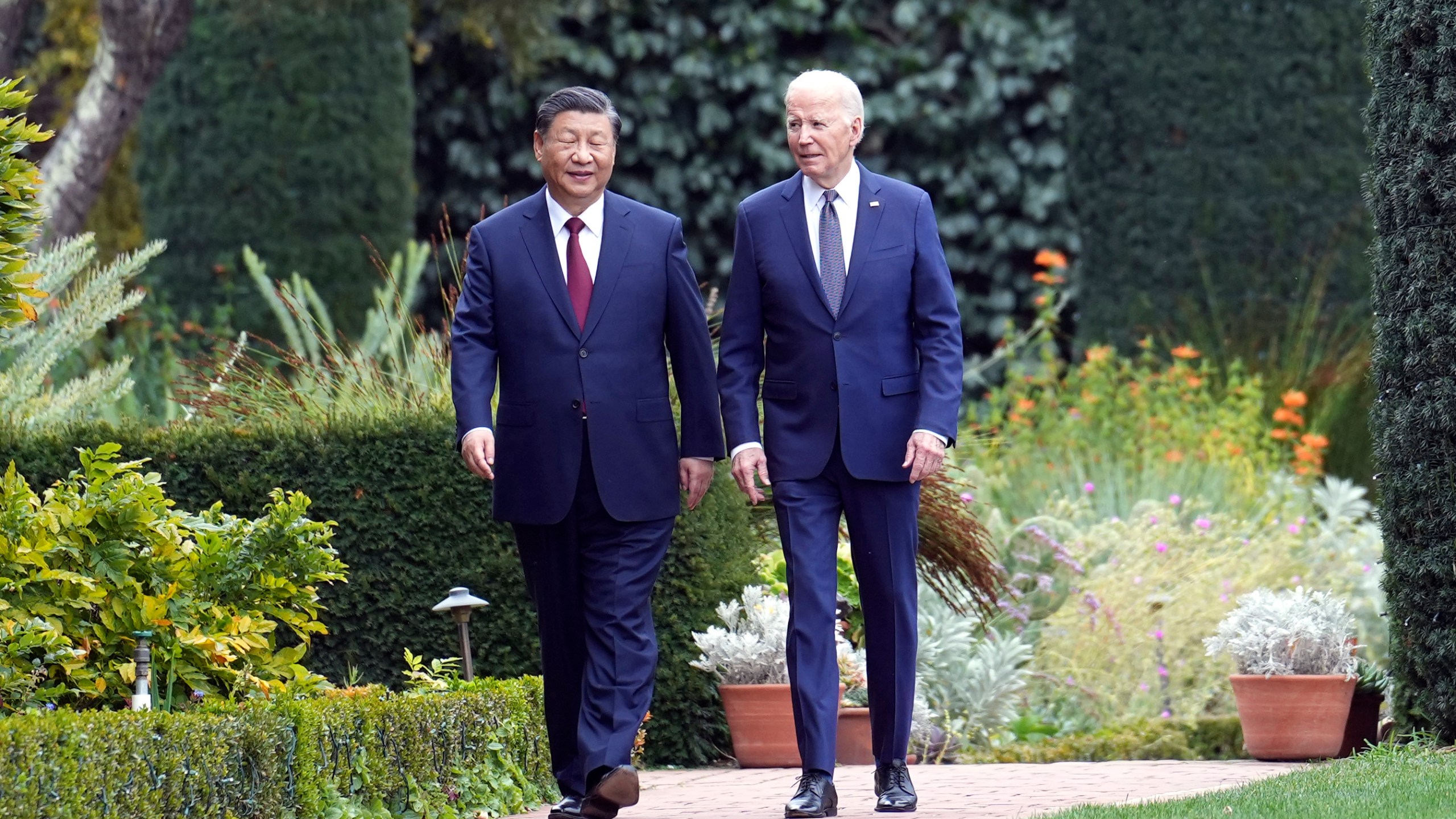 President Joe Biden and China's President President Xi Jinping walk in the gardens at the Filoli Estate in Woodside, Calif., Wednesday, Nov, 15, 2023, on the sidelines of the Asia-Pacific Economic Cooperative conference. (Doug Mills/The New York Times via AP, Pool)