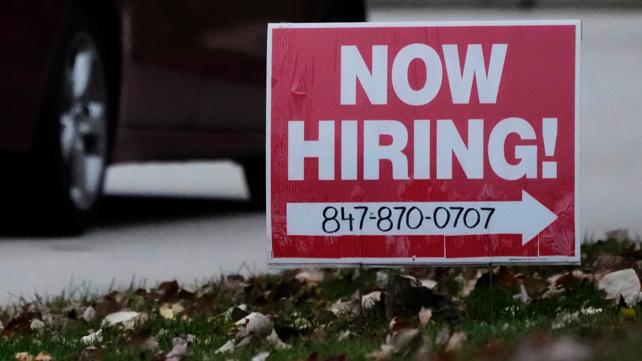 A hiring sign is displayed in Wheeling, Ill., Tuesday, Nov. 7, 2023. On Thursday, the Labor Department reports on the number of people who applied for unemployment benefits last week. (AP Photo/Nam Y. Huh)