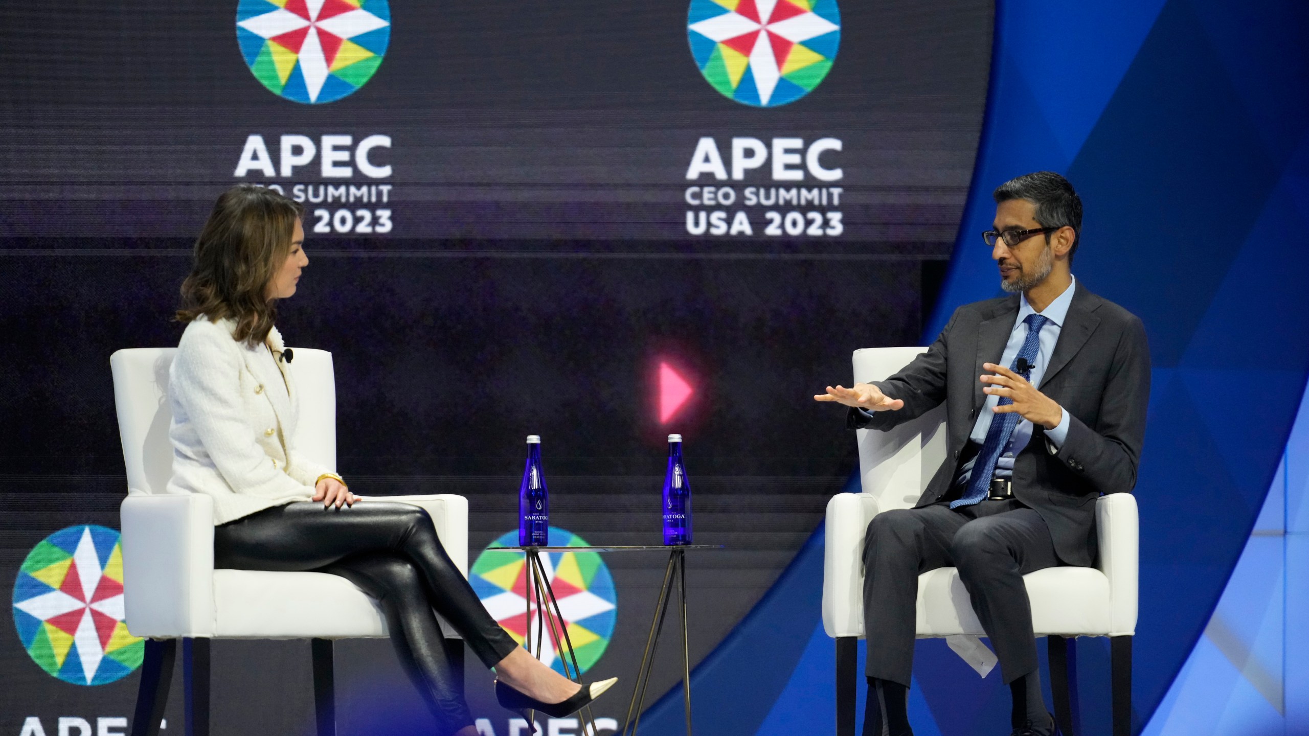 Sundar Pichai, CEO of Google and Alphabet, right, talks to moderator Emily Chang, of Bloomberg, during a discussion entitled "Innovation That Empowers" during the Asia-Pacific Economic Cooperation (APEC) CEO Summit Thursday, Nov. 16, 2023, in San Francisco. (AP Photo/Eric Risberg)