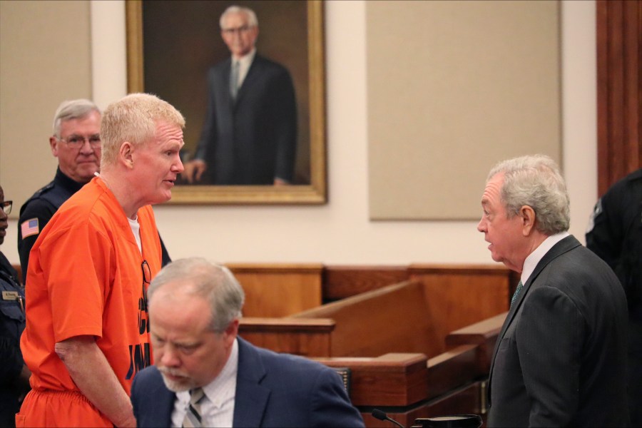 Convicted murderer Alex Murdaugh speaks with his defense attorney, Dick Harpootlian, in Beaufort, S.C. on Friday, Nov. 17, 2023. A pretrial hearing is scheduled Friday on state charges that Murdaugh stole money from his legal clients. (AP Photo/James Pollard)