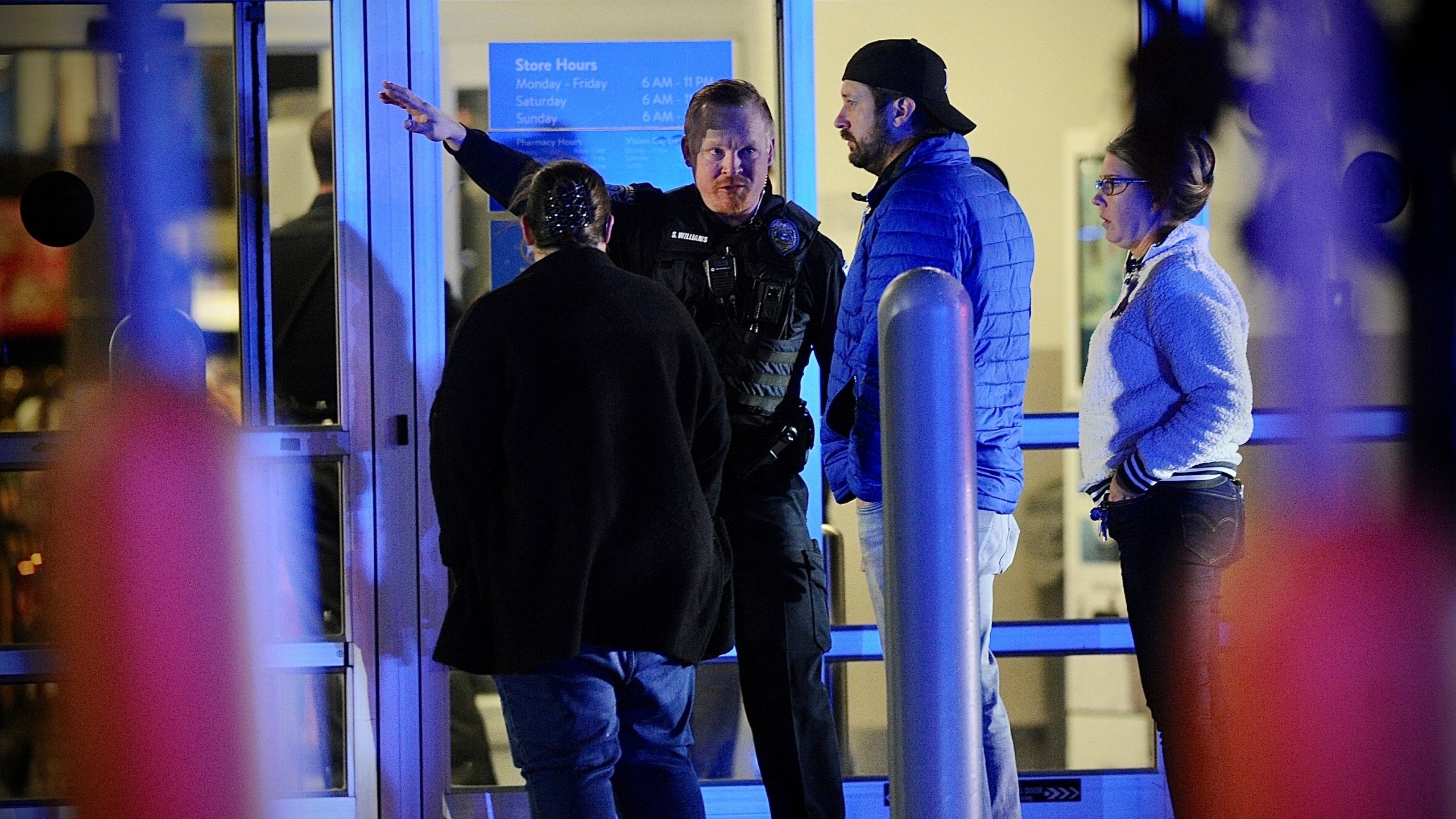 Police respond to the scene of a shooting on Monday, Nov. 20, 2023 in Beavercreek, Ohio. Police say a shooter opened fire at a Walmart, wounding four people before apparently killing himself. The attack took place Monday night at a Walmart in Beavercreek, in the Dayton metropolitan area. (Marshall Gorby/Dayton Daily News via AP)