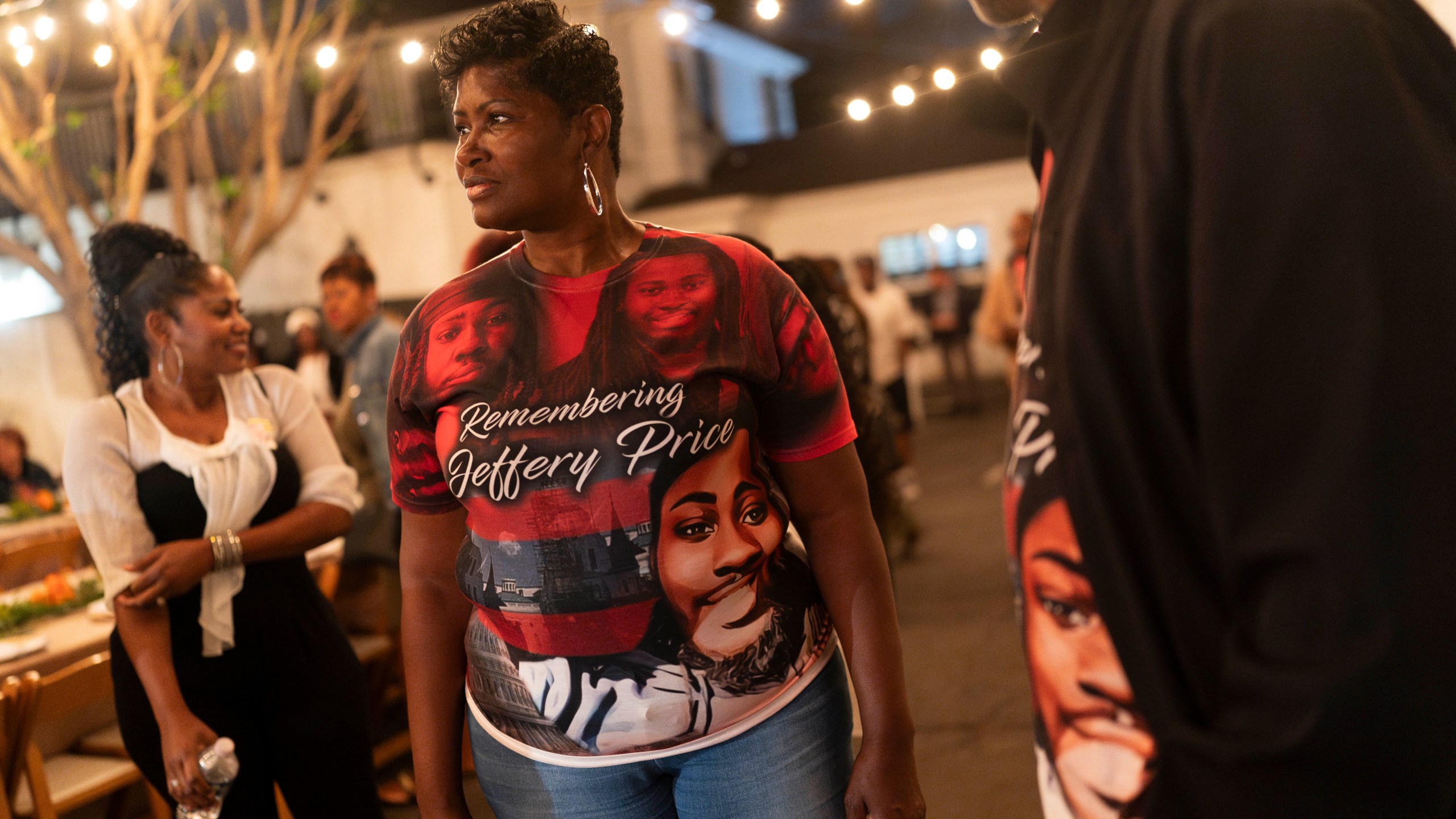 Jeffrey Price, right, and Yolanda Price, wearing T-shirts honoring Price Jr., attend a welcome dinner for the annual Families United 4 Justice Network Conference in the Studio City neighborhood of Los Angeles, Thursday, Sept. 28, 2023. Price Jr. was killed in a 2018 crash involving a police vehicle. The event was hosted by the Black Lives Matter Global Network Foundation at its mansion. (AP Photo/Jae C. Hong)