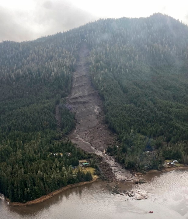 This photo provided by Sunrise Aviation shows the landslide that occurred the previous evening near Wrangell, Alaska, on Nov. 21, 2023. Authorities said at least one person died and others were believed missing after the large landslide roared down a mountaintop into the path of three homes. (Sunrise Aviation via AP)