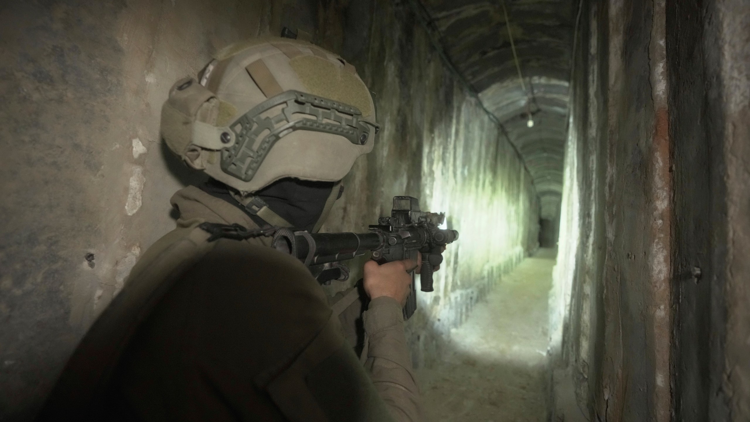 UPDATES INSTRUCTIONS - Israeli soldiers show the media an underground tunnel found underneath Shifa Hospital in Gaza City, Wednesday, Nov. 22, 2023. Israel says that Hamas militants sought cover on the grounds of the hospital and used the tunnel for military purposes. (AP Photo/Victor R. Caivano)