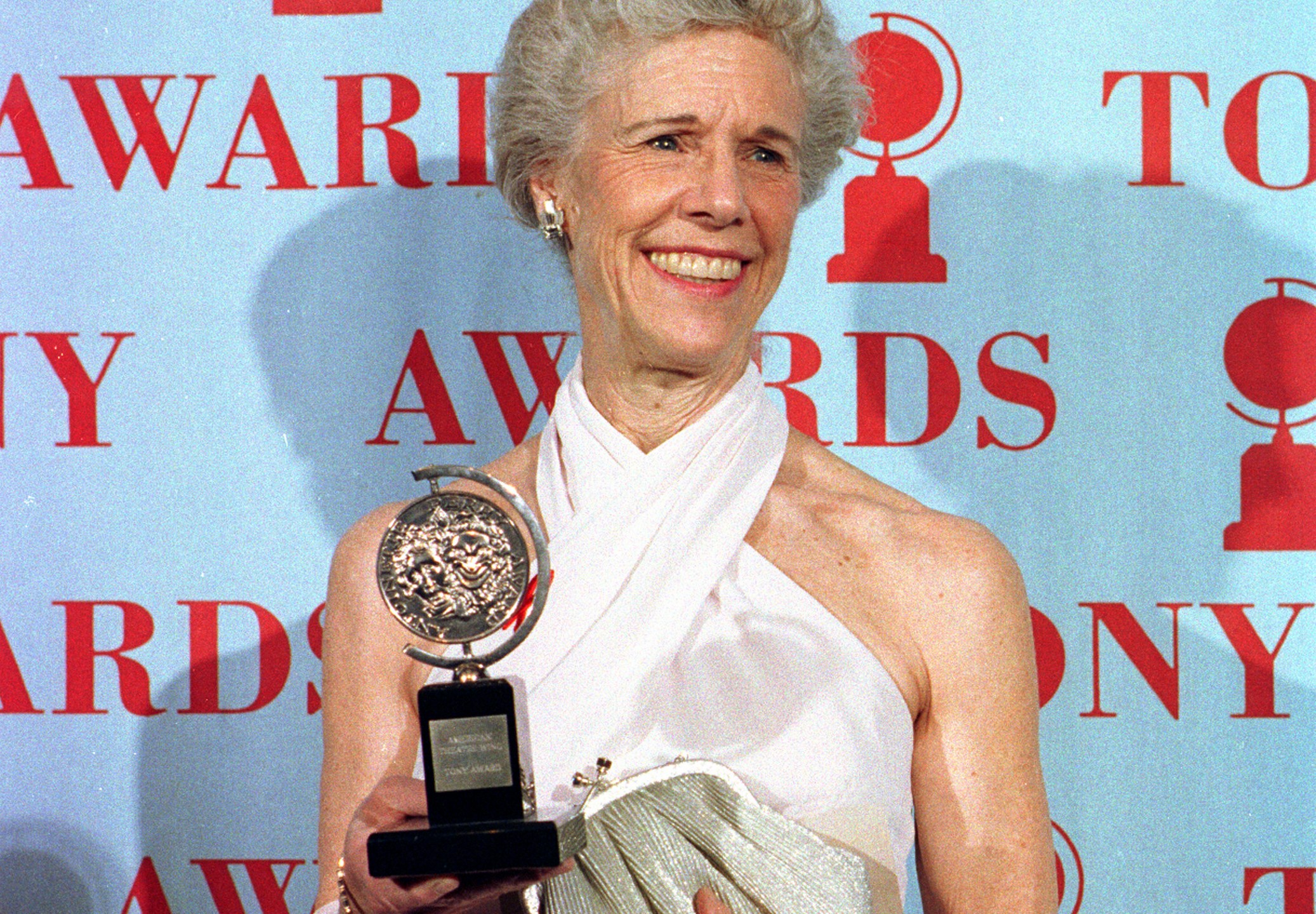 FILE - Actress Frances Sternhagen holds her award for best featured actress in a play for her performance in "The Heiress" during the Tony Awards in New York on June 4, 1995. Sternhagen, the veteran character actor who won two Tony Awards and became a familiar maternal face to TV viewers later in life in such shows as “Cheers,” “ER,” “Sex and the City” and “The Closer,” has died. She was 93. (AP Photo/Richard Drew, File)