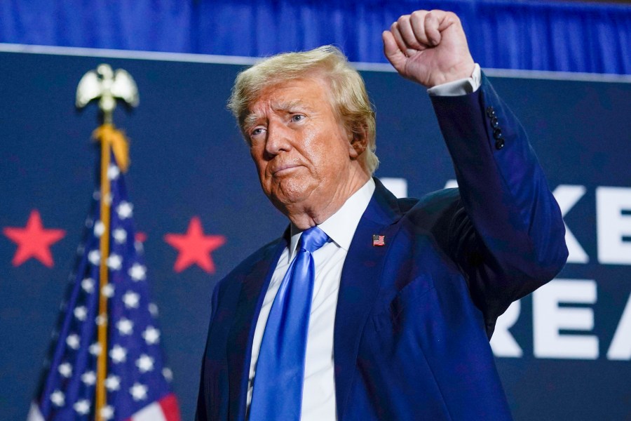 FILE - Republican presidential candidate former President Donald Trump gestures after speaking at a campaign rally Oct. 23, 2023, in Derry, N.H. Trump will be headlining a closed-door fundraiser in Florida next week as his Republican primary rivals return to the debate stage. (AP Photo/Charles Krupa, File)