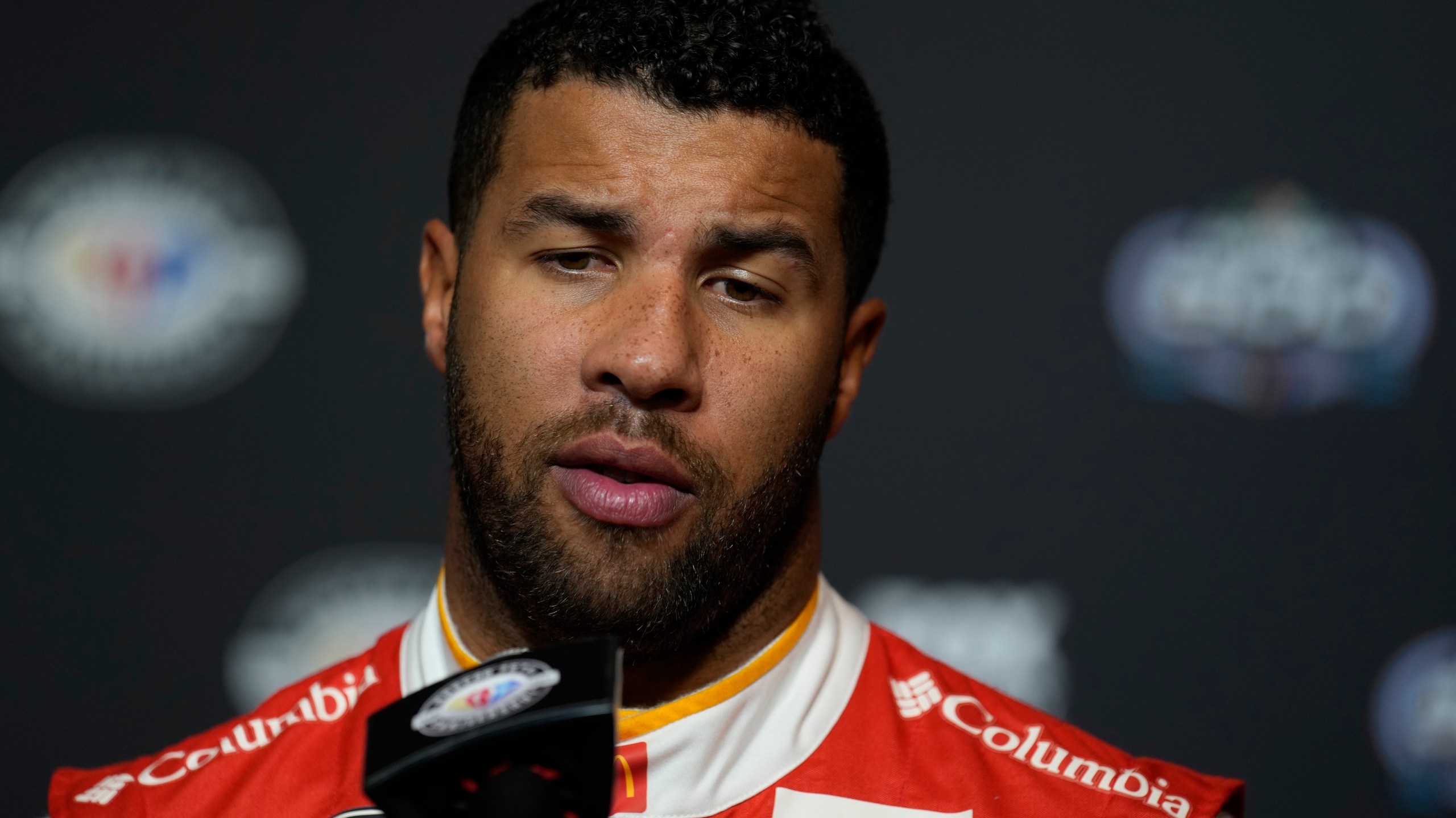 FILE - Bubba Wallace speaks during the NASCAR Daytona 500 auto racing media day Wednesday, Feb. 15, 2023, at Daytona International Speedway in Daytona Beach, Fla. Wallace acknowledged Thursday, Nov. 30, 2023, it was difficult for him to find joy in best friend Ryan Blaney’s first NASCAR championship.(AP Photo/Chris O'Meara, File)