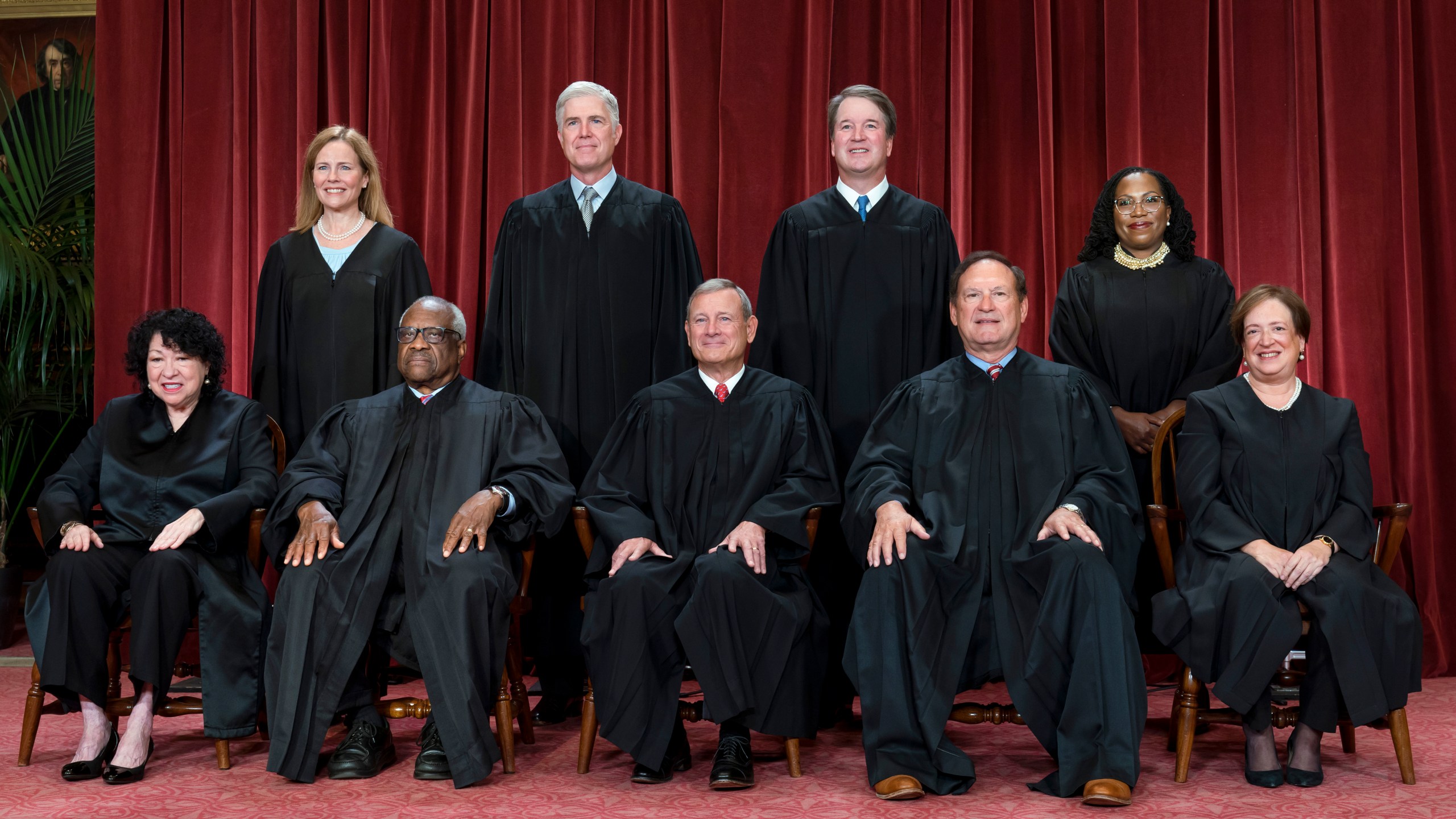 FILE - Members of the Supreme Court sit for a new group portrait following the addition of Associate Justice Ketanji Brown Jackson, at the Supreme Court building in Washington, Oct. 7, 2022. Bottom row, from left, Justice Sonia Sotomayor, Justice Clarence Thomas, Chief Justice of the United States John Roberts, Justice Samuel Alito, and Justice Elena Kagan. Top row, from left, Justice Amy Coney Barrett, Justice Neil Gorsuch, Justice Brett Kavanaugh, and Justice Ketanji Brown Jackson. (AP Photo/J. Scott Applewhite, File)