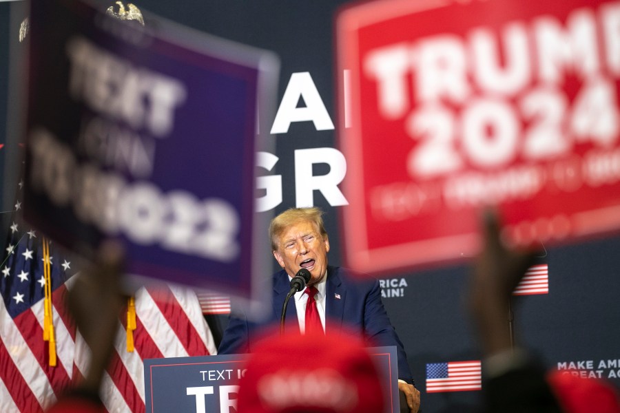 Republican presidential candidate and former President Donald Trump speaks to the crowd during a caucus event, Saturday, Dec. 2, 2023, at Kirkwood Community College in Cedar Rapids, Iowa. (Geoff Stellfox/The Gazette via AP)