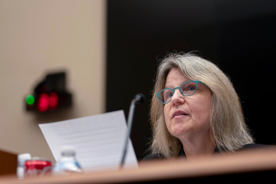 Massachusetts Institute of Technology (MIT) President Sally Kornbluth reads her opening statement during a hearing of the House Committee on Education on Capitol Hill, Tuesday, Dec. 5, 2023 in Washington. (AP Photo/Mark Schiefelbein)