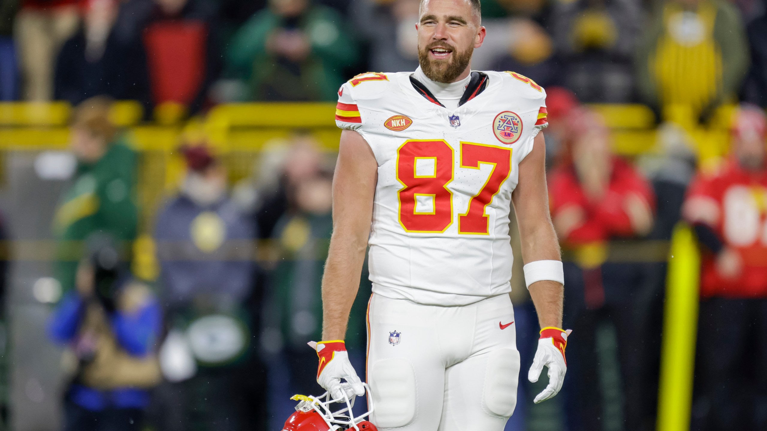 FILE - Kansas City Chiefs tight end Travis Kelce (87) warms up before an NFL football game, Dec. 3, 2023, in Green Bay, Wis. This year's lists of the most mispronounced words in the U.S. and Britain were released on Thursday, Dec. 7, by the online language learning company Babbel. Earning a place on the U.S. list was the last name of Kelce whose relationship with Taylor Swift has grabbed countless headlines. Whether Kelce should be pronounced with one or two syllables, Kels or KEL-See, has been a topic of discussion even in his own family. (AP Photo/Matt Ludtke, File)